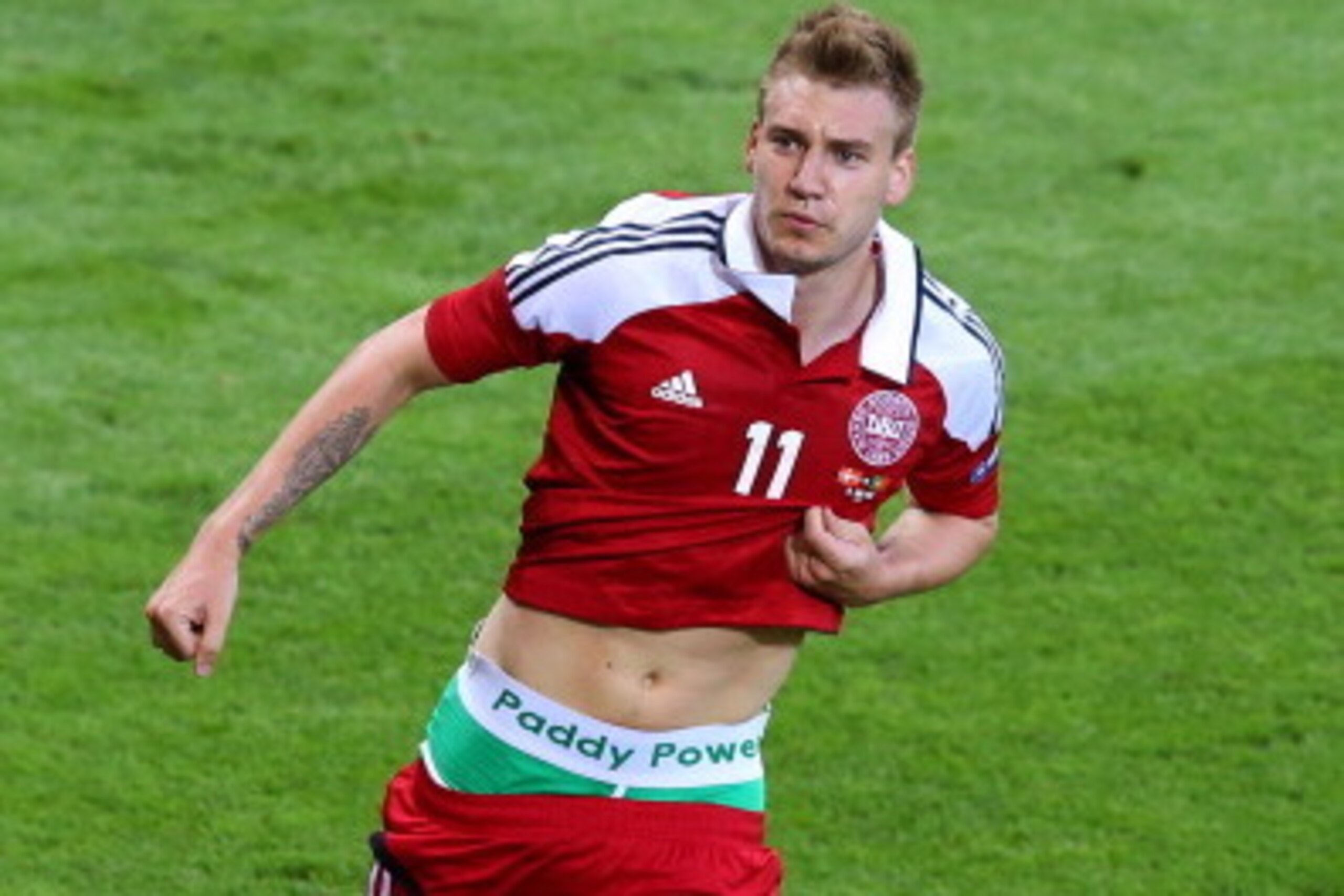 L'VIV, UKRAINE - JUNE 13:  Nicklas Bendtner of Denmark celebrates scoring the second goal during the UEFA EURO 2012 group B match between Denmark and Portugal at Arena Lviv on June 13, 2012 in L'viv, Ukraine.  (Photo by Alex Livesey/Getty Images)