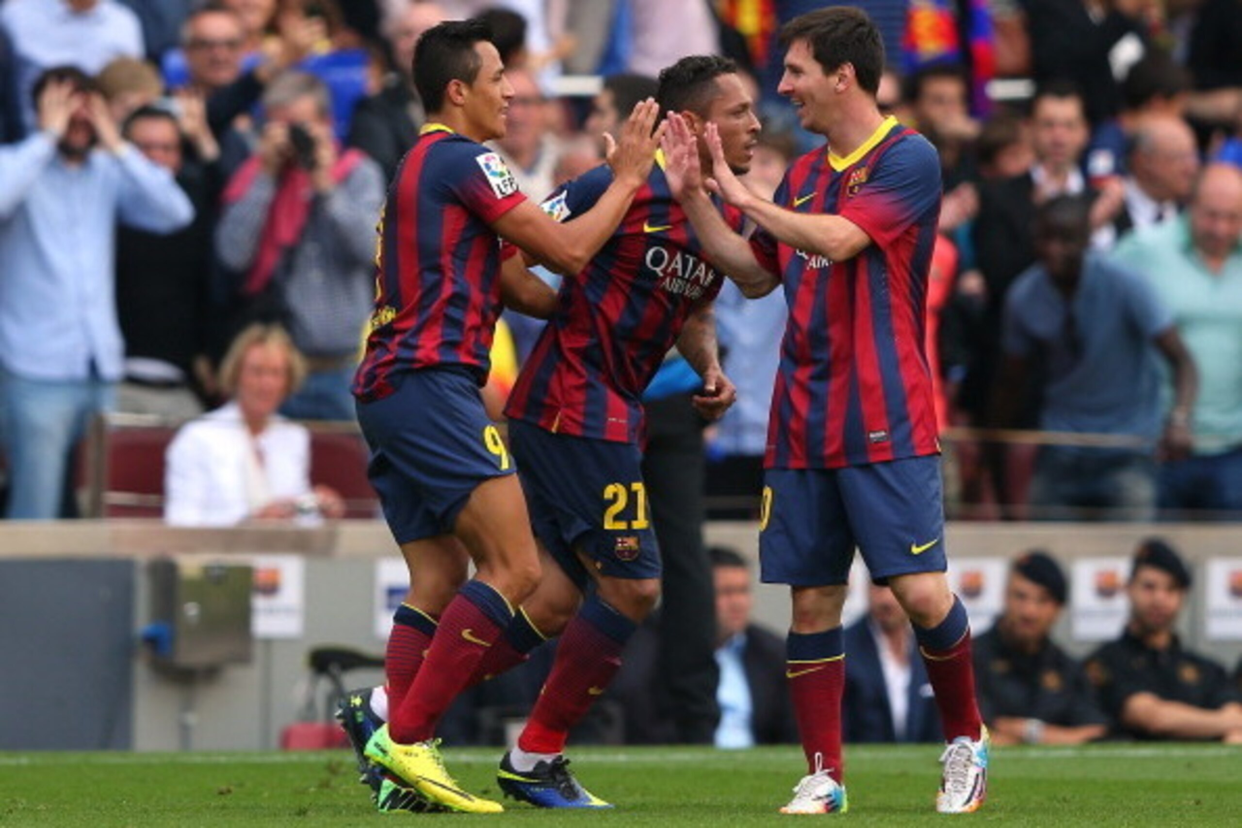 BARCELONA, SPAIN - MAY 17:  Alexis Sanchez of FC Barcelona celebrates with Lionel Messi after scoring the opening goal during the La Liga match between FC Barcelona and Club Atletico de Madrid at Camp Nou on May 17, 2014 in Barcelona, Spain.  (Photo by Al