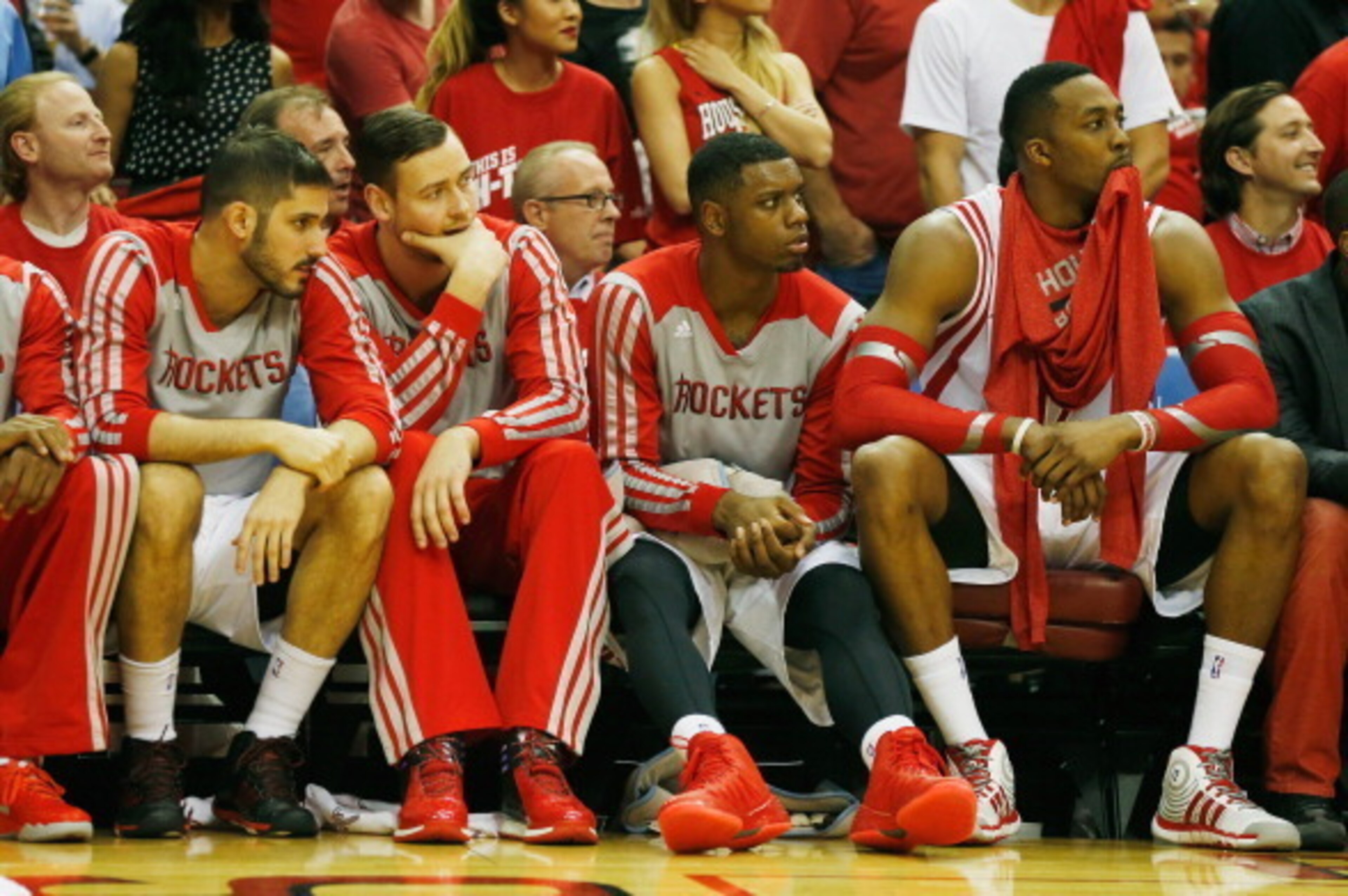 HOUSTON, TX - APRIL 23: (L-R) Omri Casspi #18, Donatas Motiejunas #20, Terrence Jones #6 and Dwight Howard #12 of the Houston Rockets sit on the bench against the Portland Trail Blazers during the second half of Game Two of the Western Conference Quarter HOUSTON, TX - APRIL 23: (L-R) Omri Casspi #18, Donatas Motiejunas #20, Terrence Jones #6 and Dwight Howard #12 of the Houston Rockets sit on the bench against the Portland Trail Blazers during the second half of Game Two of the Western Conference Quarter
