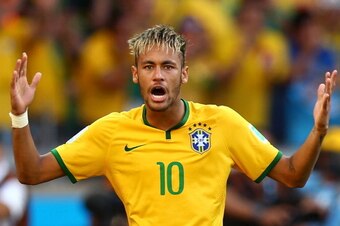 BELO HORIZONTE, BRAZIL - JUNE 28:  Neymar of Brazil celebrates after defeating Chile in a penalty shootout during the 2014 FIFA World Cup Brazil round of 16 match between Brazil and Chile at Estadio Mineirao on June 28, 2014 in Belo Horizonte, Brazil.  (P