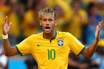 BELO HORIZONTE, BRAZIL - JUNE 28:  Neymar of Brazil celebrates after defeating Chile in a penalty shootout during the 2014 FIFA World Cup Brazil round of 16 match between Brazil and Chile at Estadio Mineirao on June 28, 2014 in Belo Horizonte, Brazil.  (P