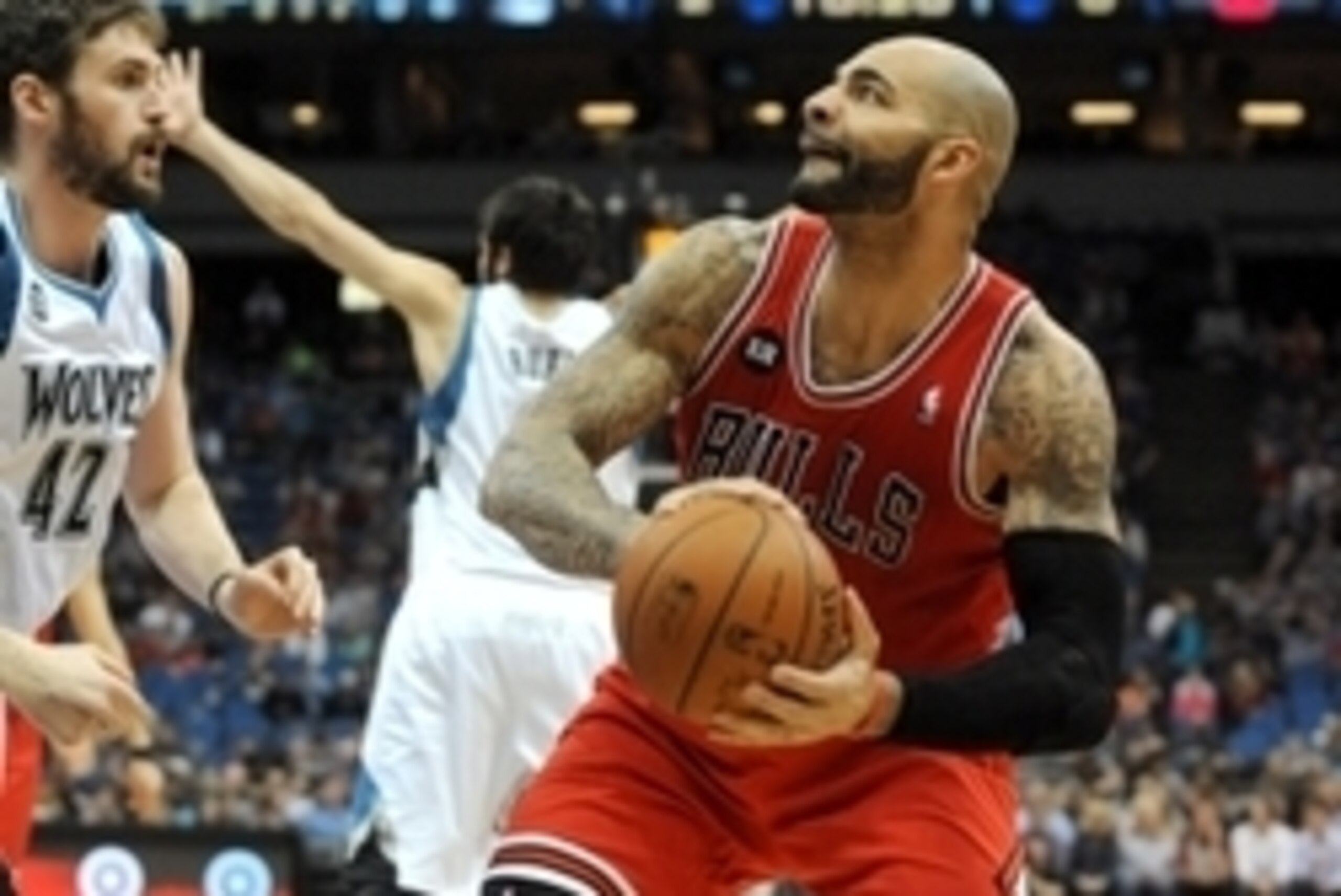 Apr 9, 2014; Minneapolis, MN, USA;  Chicago Bulls forward Carlos Boozer looks to shoot in the first half against the Minnesota Timberwolves at Target Center.  The Bulls defeated the Wolves 102-87.  Mandatory Credit: Marilyn Indahl-USA TODAY Sports