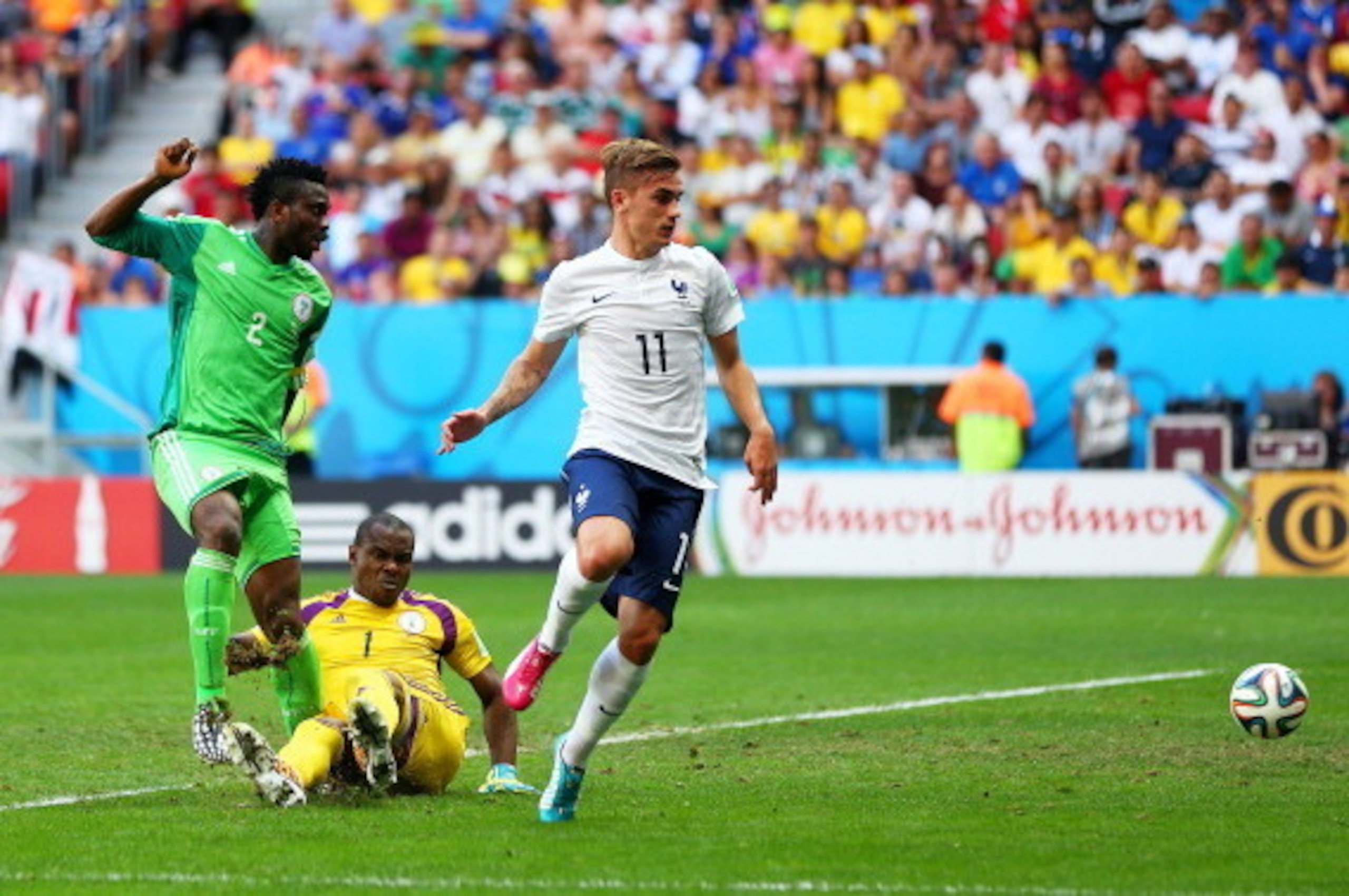 BRASILIA, BRAZIL - JUNE 30: Joseph Yobo of Nigeria (L) scores an own goal as goalkeeper Vincent Enyeama and Antoine Griezmann of France look on during the 2014 FIFA World Cup Brazil Round of 16 match between France and Nigeria at Estadio Nacional on June 