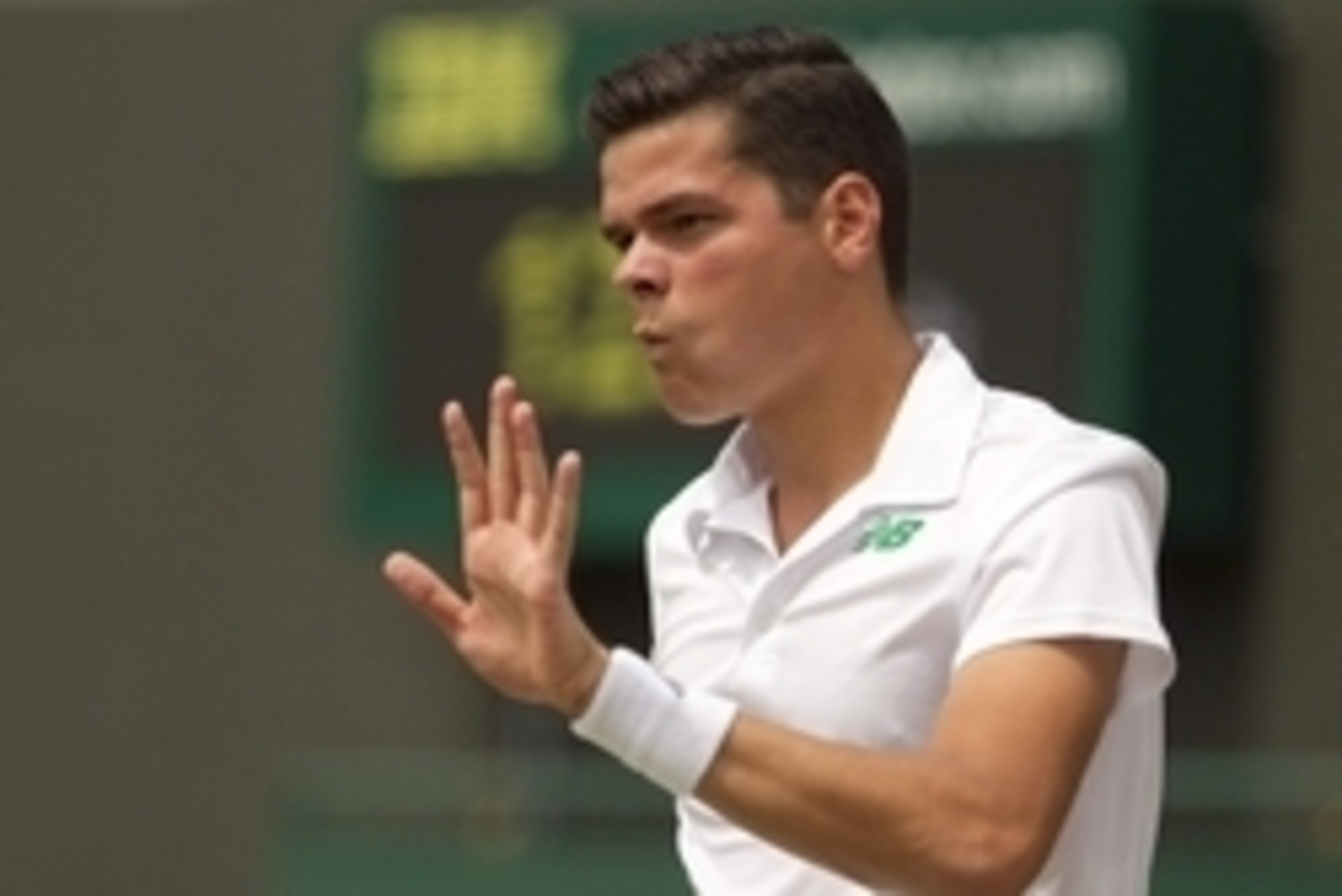 Jun 26, 2014; London, United Kingdom; Milos Raonic (CAN) reacts during his match against Jack Sock (USA) on day four of the 2014 Wimbledon Championships at the All England Lawn and Tennis Club. Mandatory Credit: Susan Mullane-USA TODAY Sports Jun 26, 2014; London, United Kingdom; Milos Raonic (CAN) reacts during his match against Jack Sock (USA) on day four of the 2014 Wimbledon Championships at the All England Lawn and Tennis Club. Mandatory Credit: Susan Mullane-USA TODAY Sports