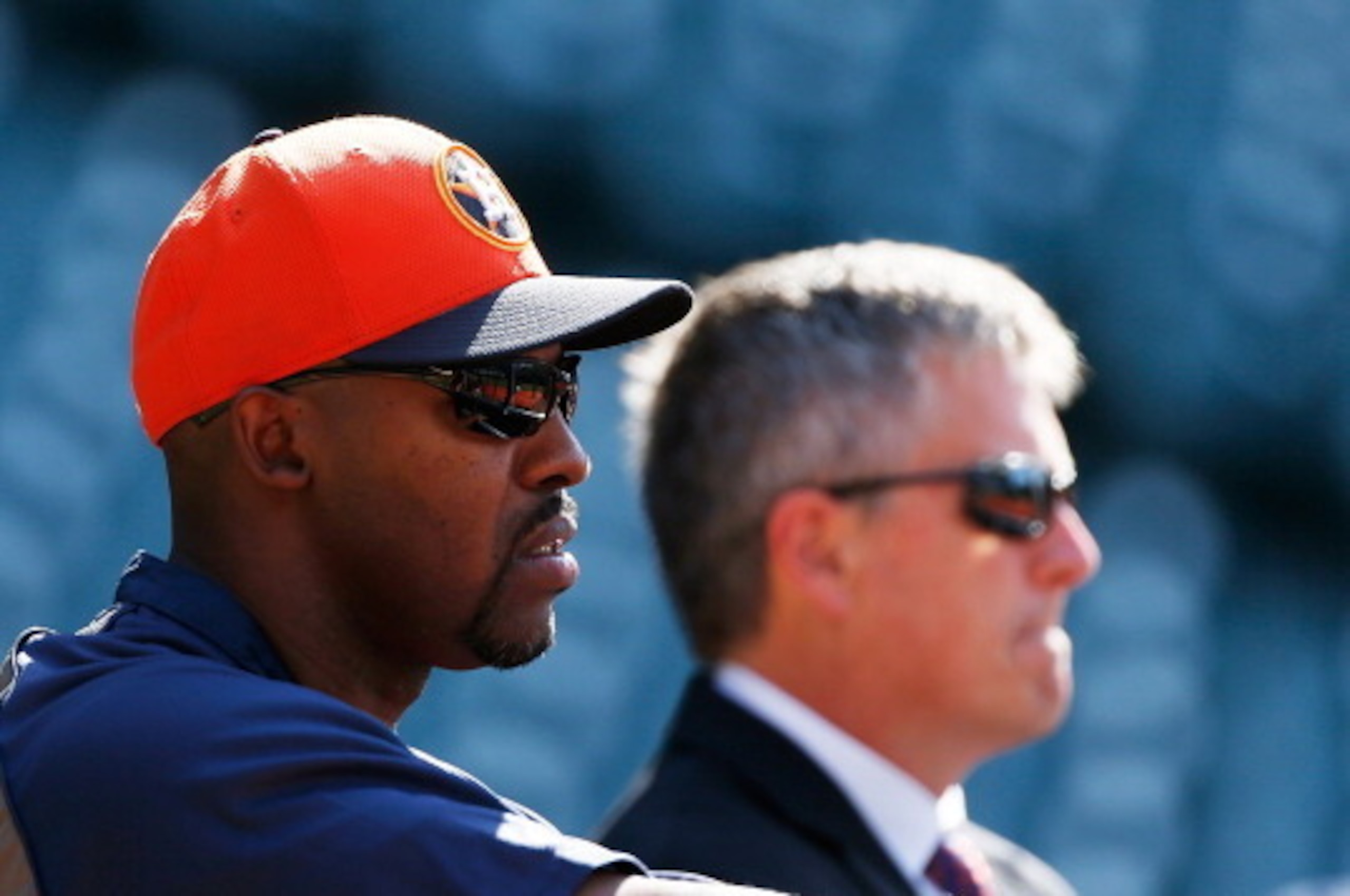HOUSTON, TX - APRIL 22:  Houston Astros manager Bo Porter #16 (L) and general manager Jeff Luhnow wait near the batting cage prior to the start of the game against the Seattle Mariners at Minute Maid Park on April 22, 2013 in Houston, Texas.  (Photo by Sc