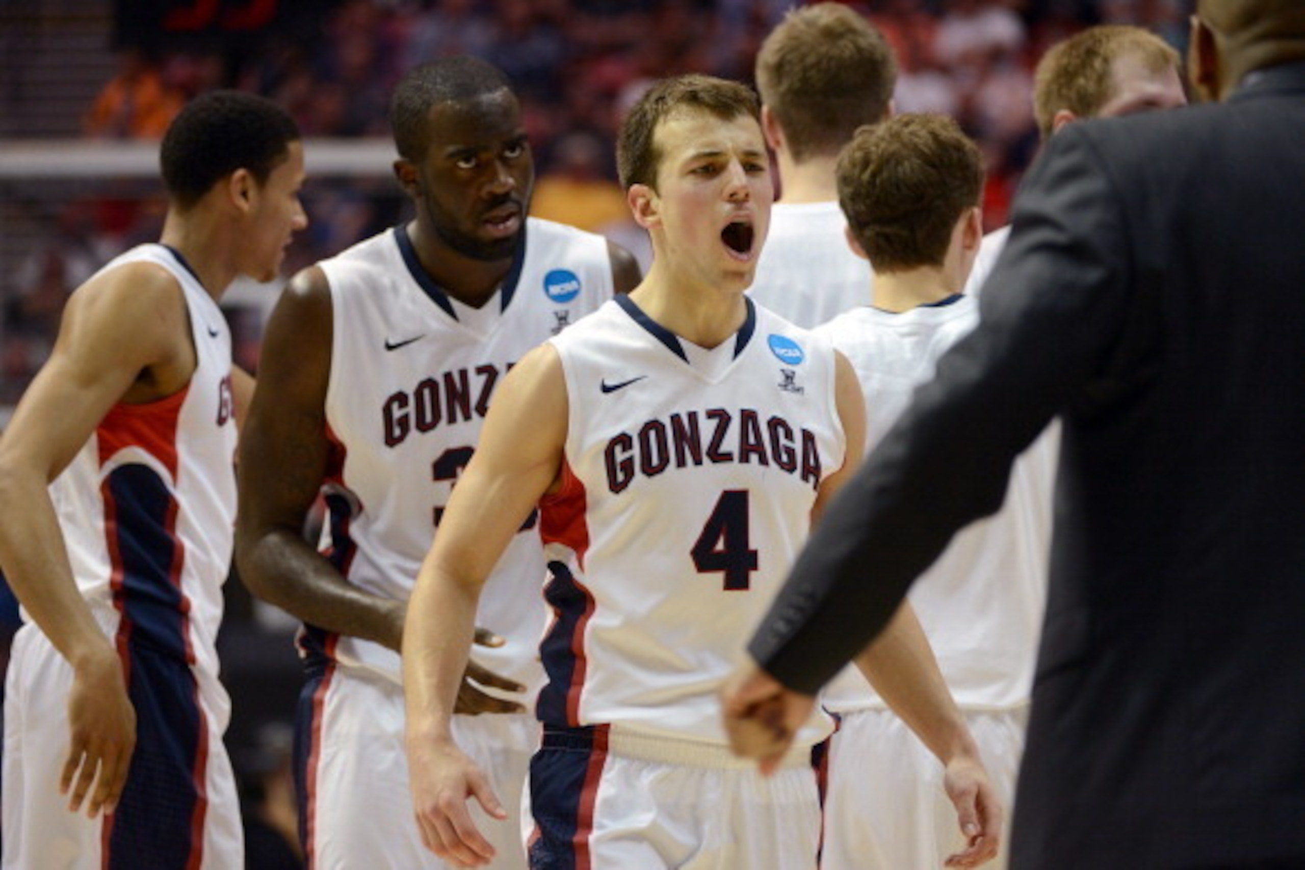 SAN DIEGO, CA - MARCH 21:  Kevin Pangos #4 of the Gonzaga Bulldogs reacts as he heads to the bench for a time out during their game against the Oklahoma State Cowboys in the second round of the 2014 NCAA Men's Basketball Tournament at Viejas Arena on Marc