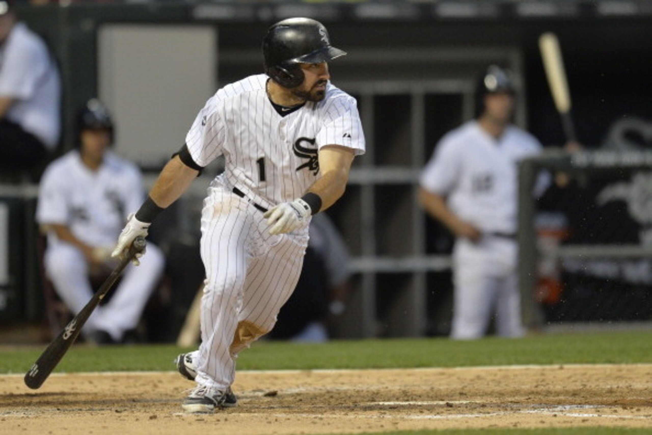 CHICAGO, IL - JUNE 17:  Adam Eaton #1 of the Chicago White Sox hits an RBI single scoring Alexei Ramirez during the fourth inning at U.S. Cellular Field on June 17, 2014 in Chicago, Illinois. Dayan Viciedo #24 of the Chicago White Sox also scored after a 