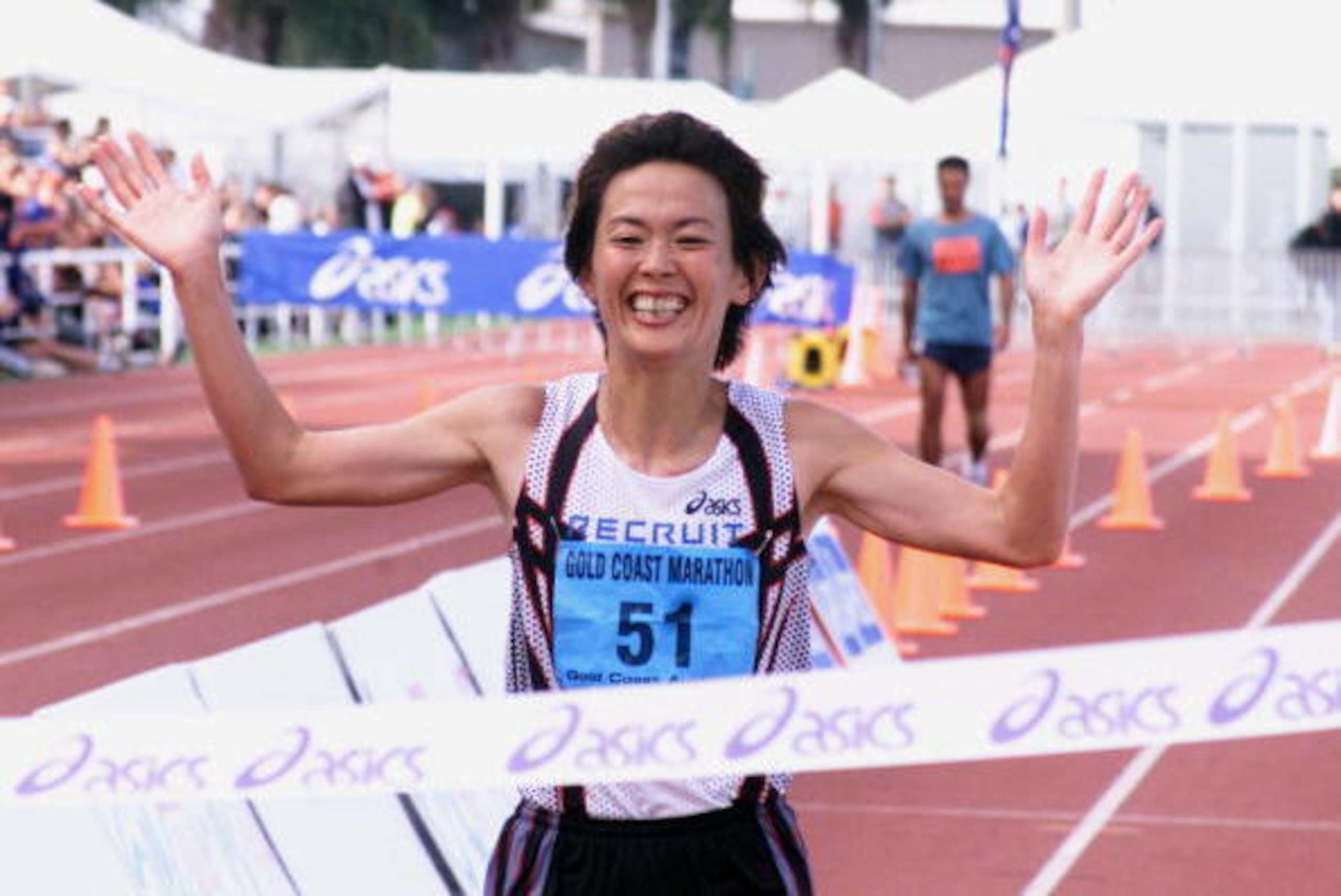24 June 2001:  Yuko Arimori of Japan celebrates her victory in the Women's Gold Coast Marathon with a time of 2:35:41:0 at the Runaway Bay Super Sports Centre, Gold Coast, Australia. DIGITAL IMAGE.  Mandatory Credit: Jonathan Wood/ALLSPORT