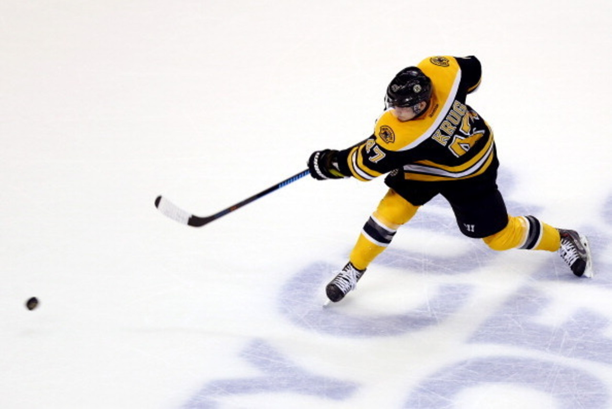 BOSTON, MA - MAY 14: Torey Krug #47 of the Boston Bruins takes a shot against the Montreal Canadiens during Game Seven of the Second Round of the 2014 NHL Stanley Cup Playoffs at the TD Garden on May 14, 2014 in Boston, Massachusetts.  (Photo by Alex Trau