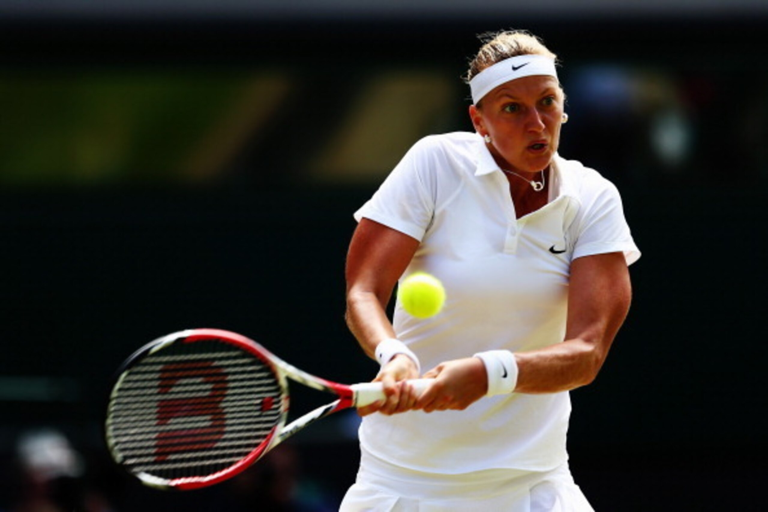 LONDON, ENGLAND - JULY 03:  Petra Kvitova of Czech Republic plays a backhand return during her Ladies' Singles semi-final match against Lucie Safarova of Czech Republic on day ten of the Wimbledon Lawn Tennis Championships at the All England Lawn Tennis a