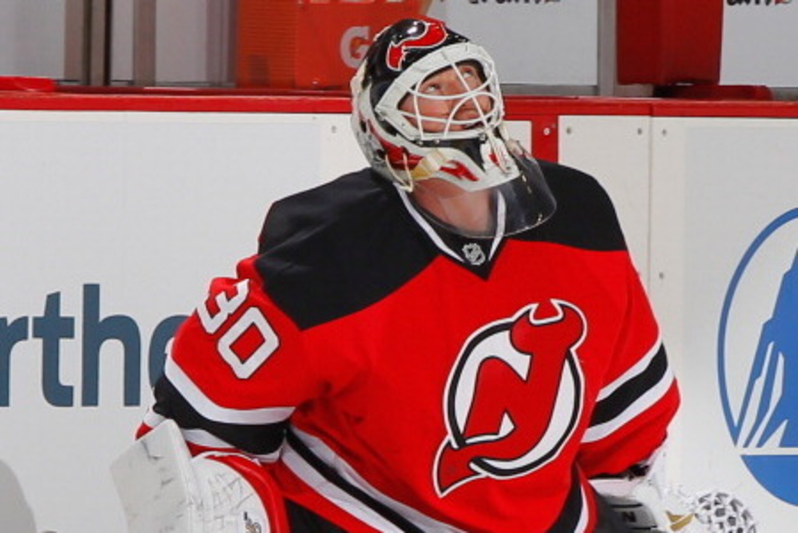 NEWARK, NJ - APRIL 13: Starting goaltender Martin Brodeur #30 of the New Jersey Devils stretches during pregame warmups prior to the final game of the 2013-2014 NHL season against the Boston Bruins at the Prudential Center on April 13, 2014 in Newark, New NEWARK, NJ - APRIL 13: Starting goaltender Martin Brodeur #30 of the New Jersey Devils stretches during pregame warmups prior to the final game of the 2013-2014 NHL season against the Boston Bruins at the Prudential Center on April 13, 2014 in Newark, New