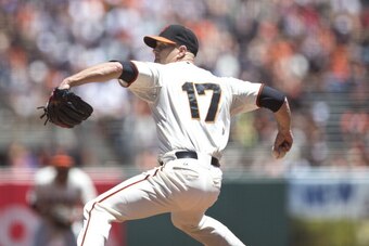 SAN FRANCISCO, CA - JUNE 29: Tim Hudson #17 of the San Francisco Giants pitches against the Cincinnati Reds during the first inning at AT&T Park on June 29, 2014 in San Francisco, California. (Photo by Jason O. Watson/Getty Images)
