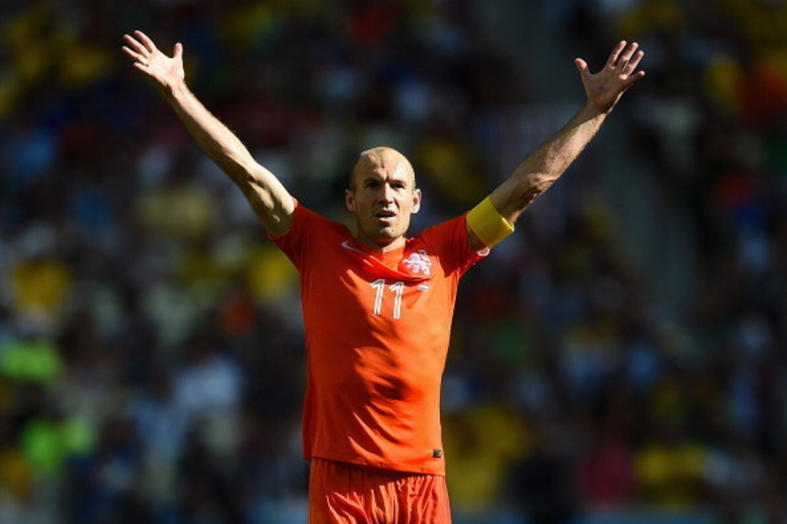 FORTALEZA, BRAZIL - JUNE 29:  Arjen Robben of the Netherlands celebrates after defeating Mexico 2-1 during the 2014 FIFA World Cup Brazil Round of 16 match between Netherlands and Mexico at Castelao on June 29, 2014 in Fortaleza, Brazil.  (Photo by Lauren