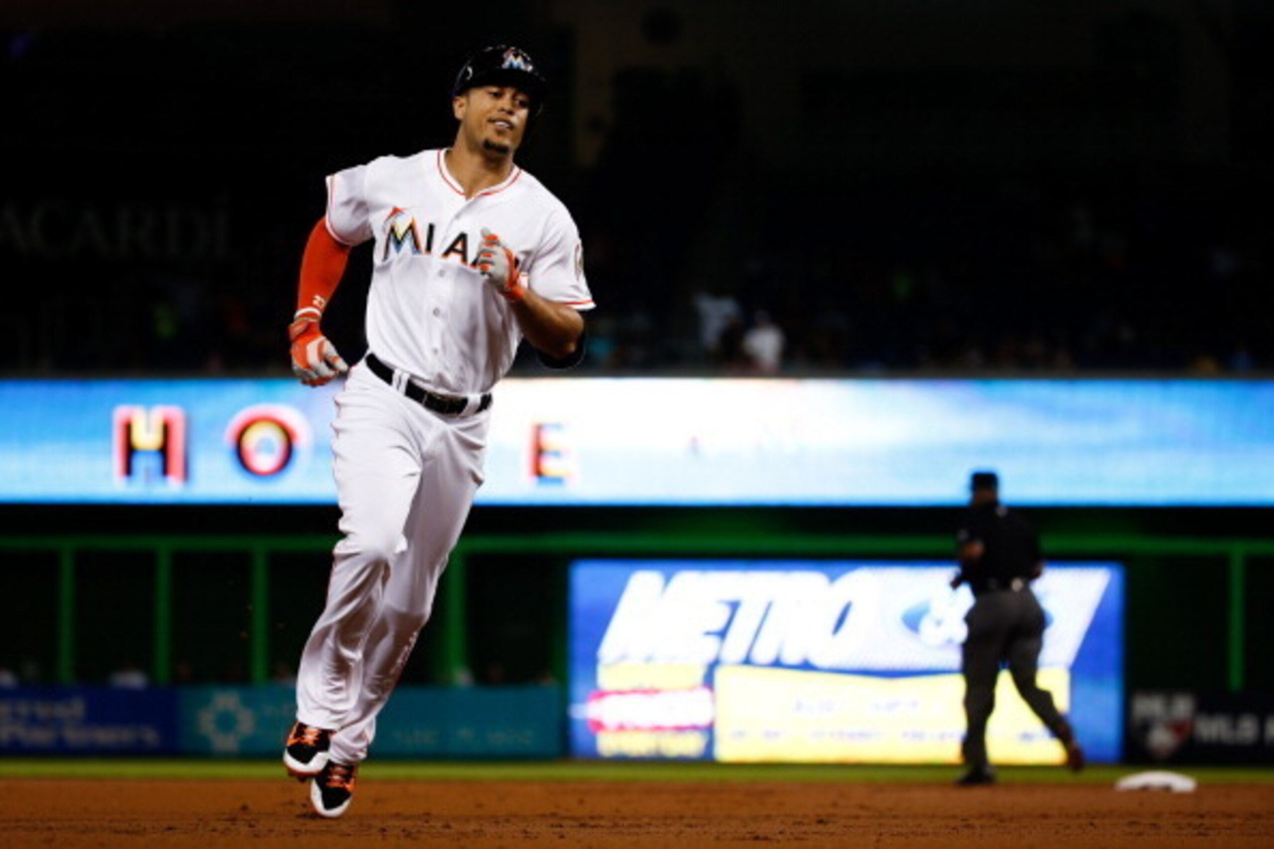 MIAMI, FL - JUNE 16: Giancarlo Stanton #27 of the Miami Marlins rounds the bases after hitting a two-run home run during the first inning of the game against the Chicago Cubs at Marlins Park on June 16, 2014 in Miami, Florida.  (Photo by Rob Foldy/Getty I