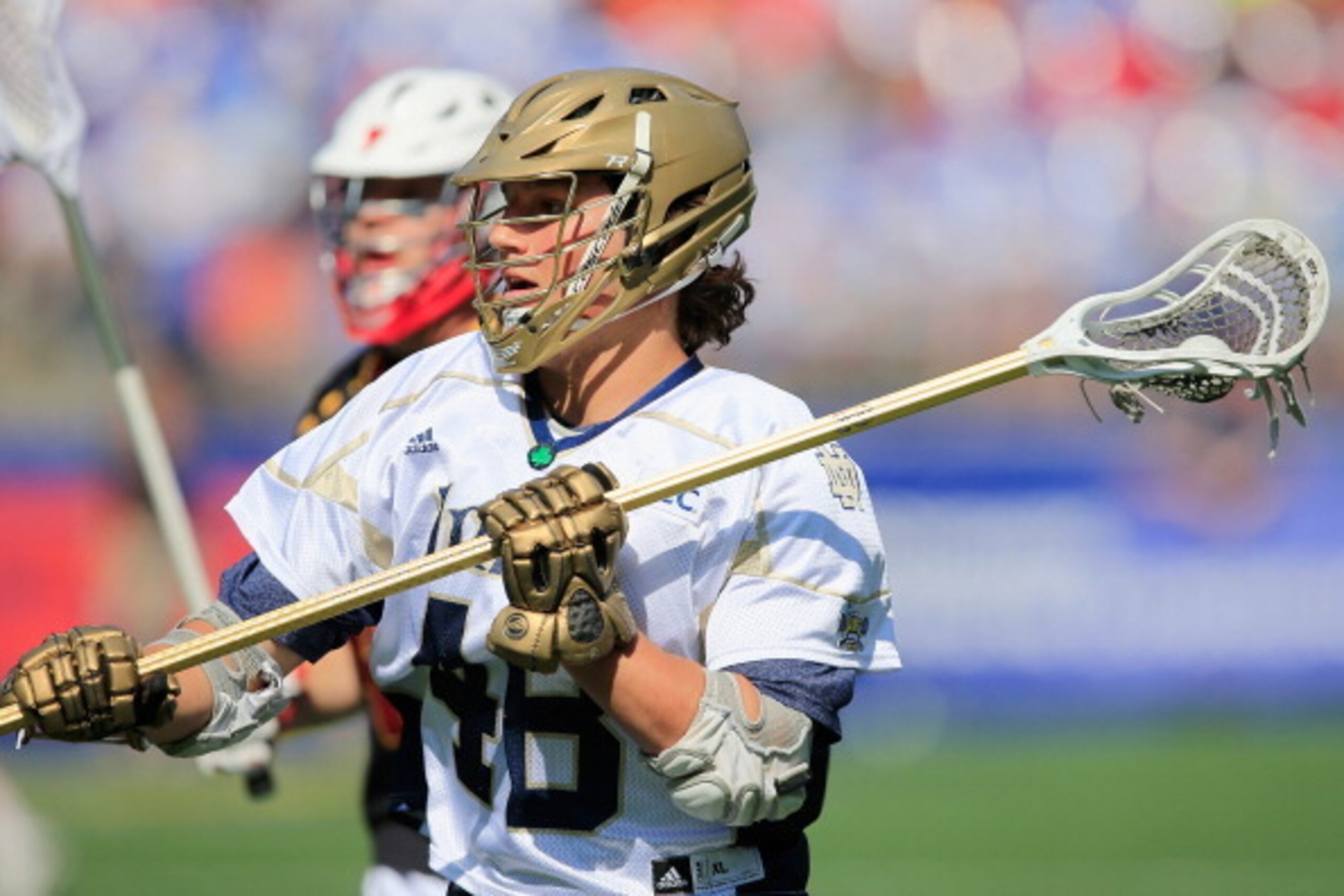 BALTIMORE, MD - MAY 24: Garrett Epple #48 of the Notre Dame Fighting Irish looks to pass against the Maryland Terrapins during the first half of the semifinals of the 2014 NCAA Division I Men's Lacrosse Championship at M&T Bank Stadium on May 24, 2014 in 