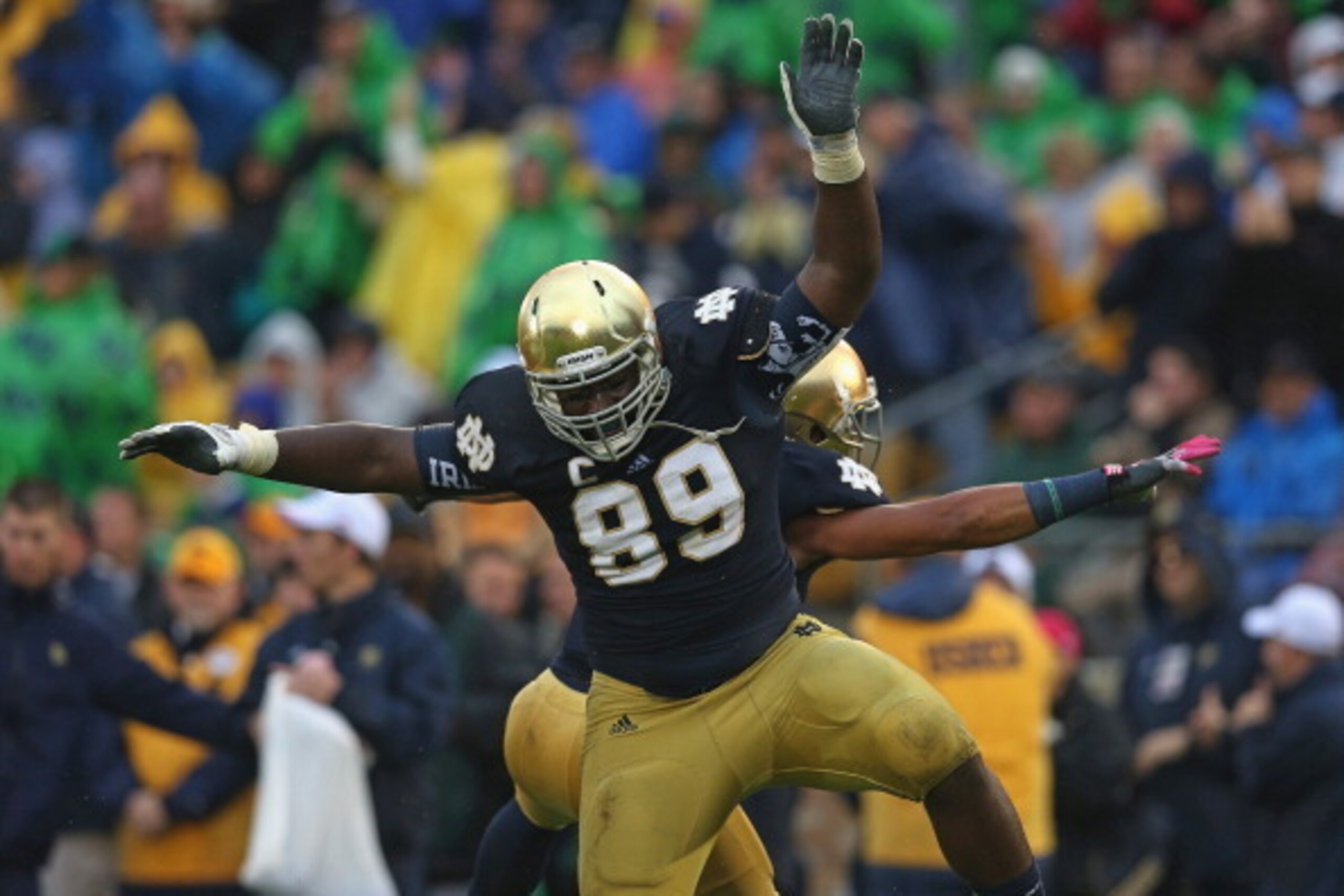 SOUTH BEND, IN - OCTOBER 13: Kapron Lewis-Moore #89 and Matthias Farley #41 of the Notre Dame Fighting Irish celebrate a blocking field goal against the Standford Cardinal at Notre Dame Stadium on October 13, 2012 in South Bend, Indiana. Notre Dame defeat