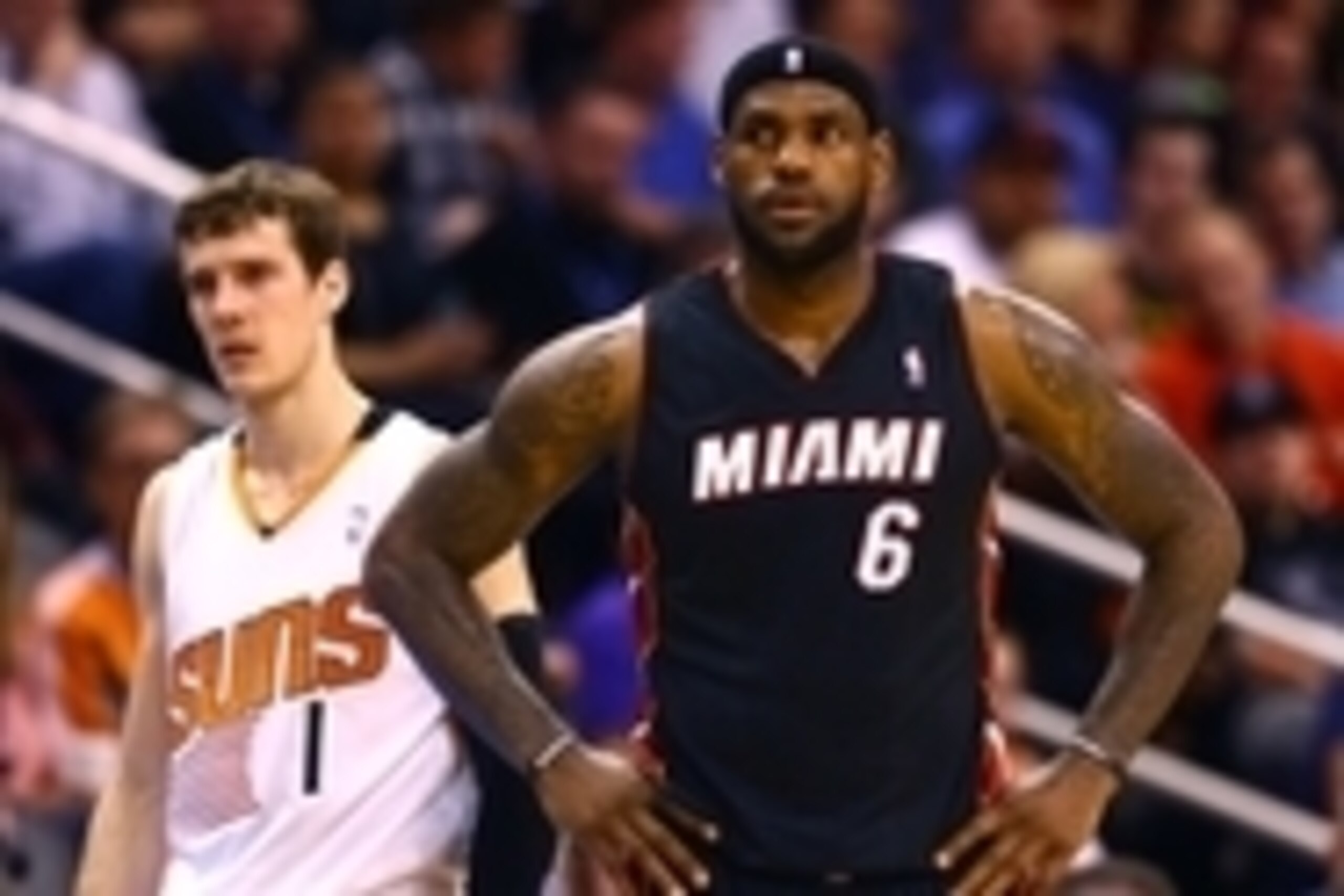 Feb 11, 2014; Phoenix, AZ, USA; Miami Heat forward LeBron James (6) against Phoenix Suns guard Goran Dragic (1) at the US Airways Center. Mandatory Credit: Mark J. Rebilas-USA TODAY Sports Feb 11, 2014; Phoenix, AZ, USA; Miami Heat forward LeBron James (6) against Phoenix Suns guard Goran Dragic (1) at the US Airways Center. Mandatory Credit: Mark J. Rebilas-USA TODAY Sports