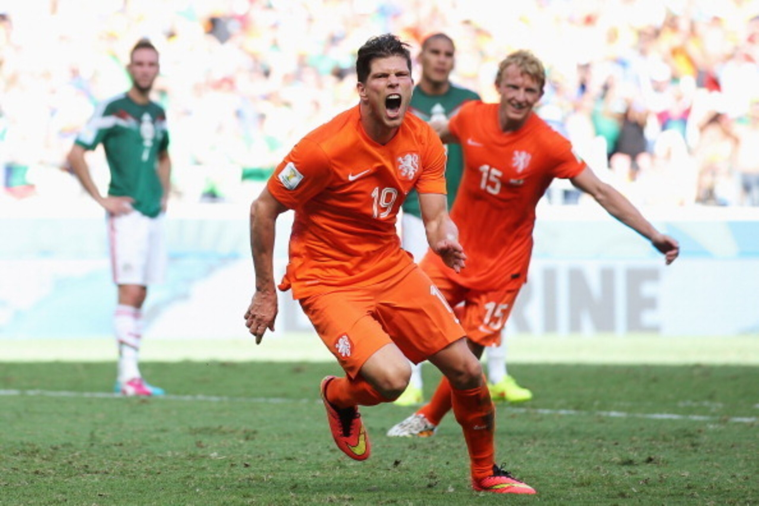 FORTALEZA, BRAZIL - JUNE 29:  Klaas-Jan Huntelaar of the Netherlands celebrates scoring his team's second goal on a penalty kick in stoppage time during the 2014 FIFA World Cup Brazil Round of 16 match between Netherlands and Mexico at Castelao on June 29