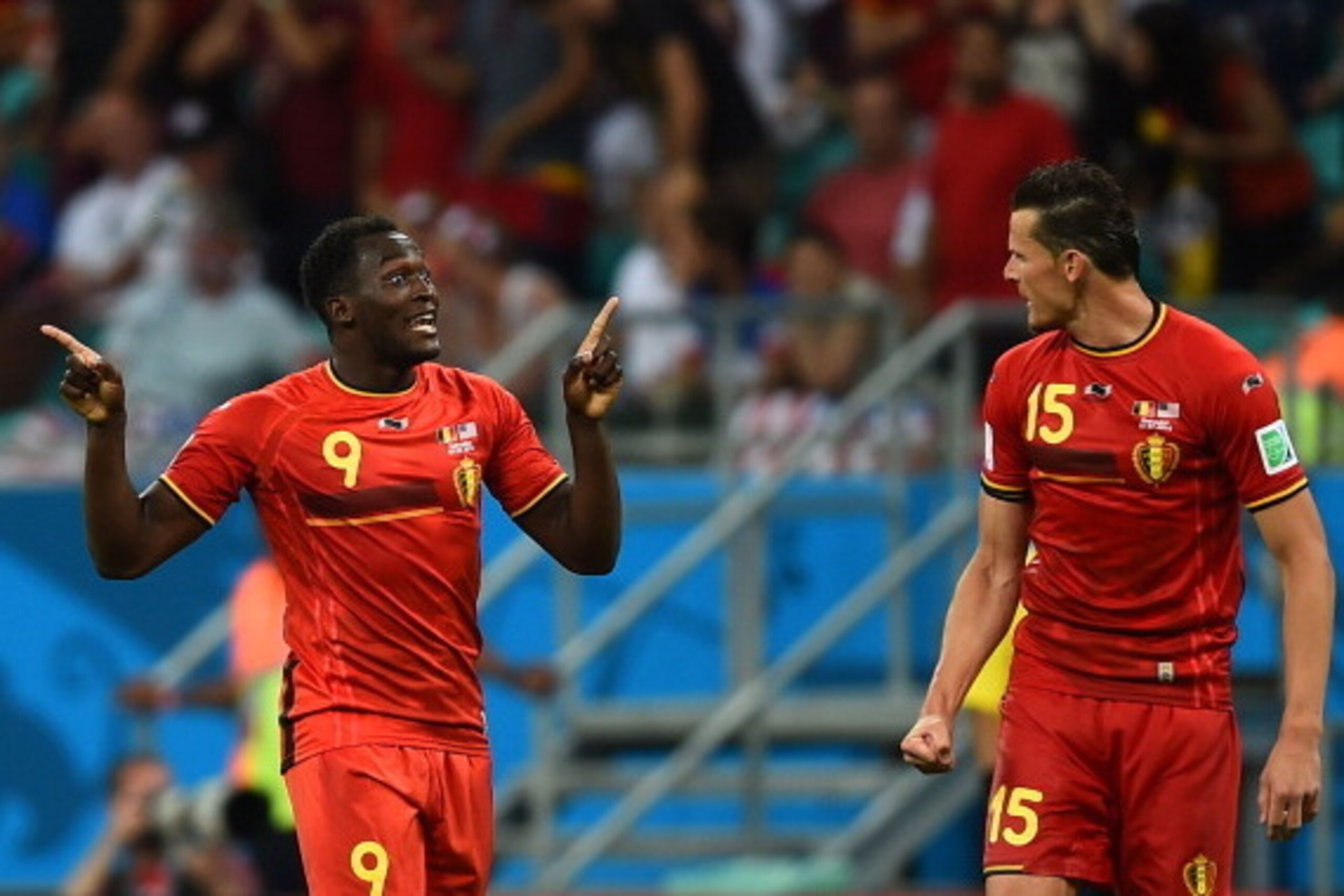 SALVADOR, BRAZIL - JULY 01:  Romelu Lukaku of Belgium celebrates scoring his team's second goal in extra time with Daniel Van Buyten during the 2014 FIFA World Cup Brazil Round of 16 match between Belgium and the United States at Arena Fonte Nova on July 