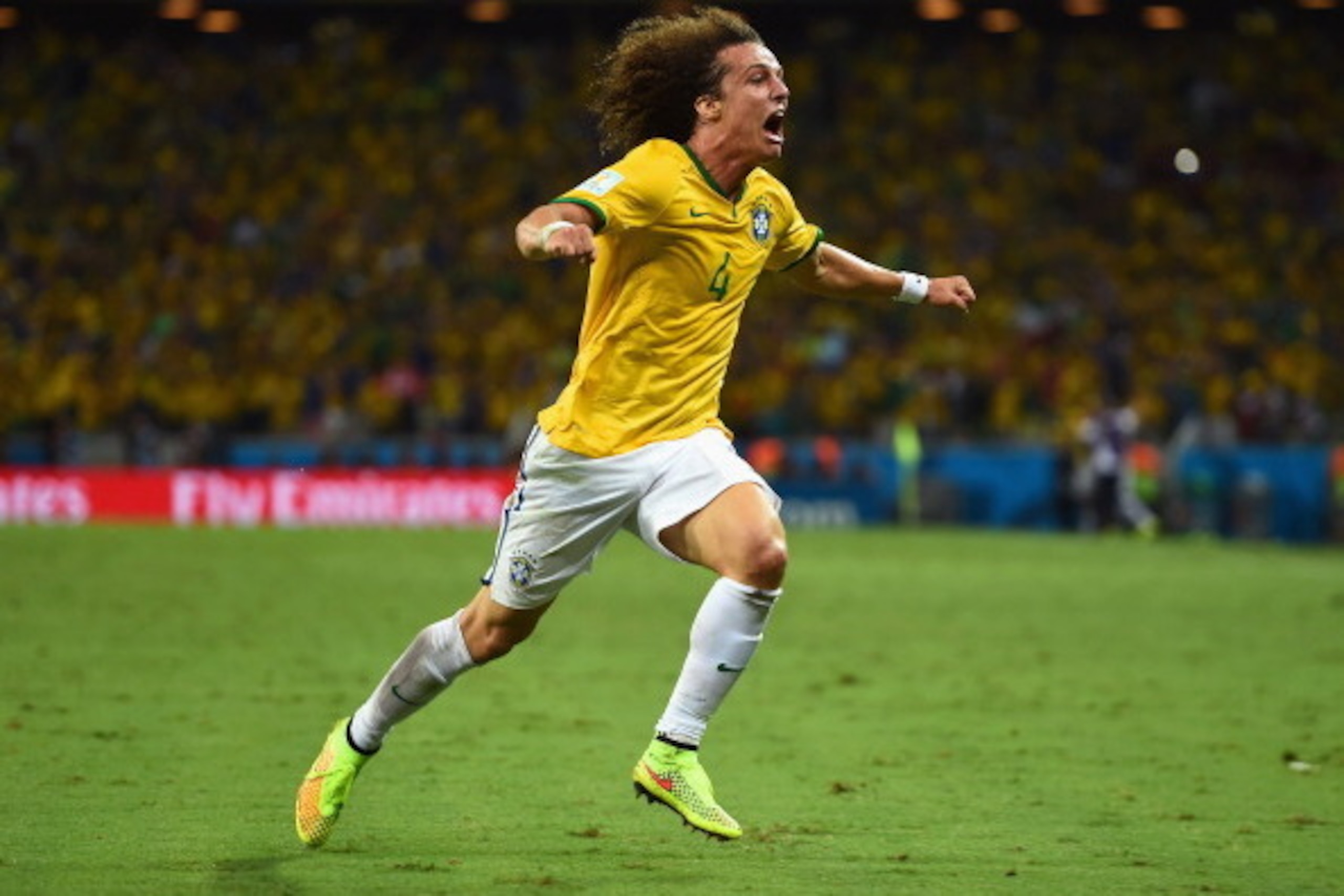 FORTALEZA, BRAZIL - JULY 04:  David Luiz of Brazil celebrates scoring his team's second goal on a free kick during the 2014 FIFA World Cup Brazil Quarter Final match between Brazil and Colombia at Castelao on July 4, 2014 in Fortaleza, Brazil.  (Photo by 