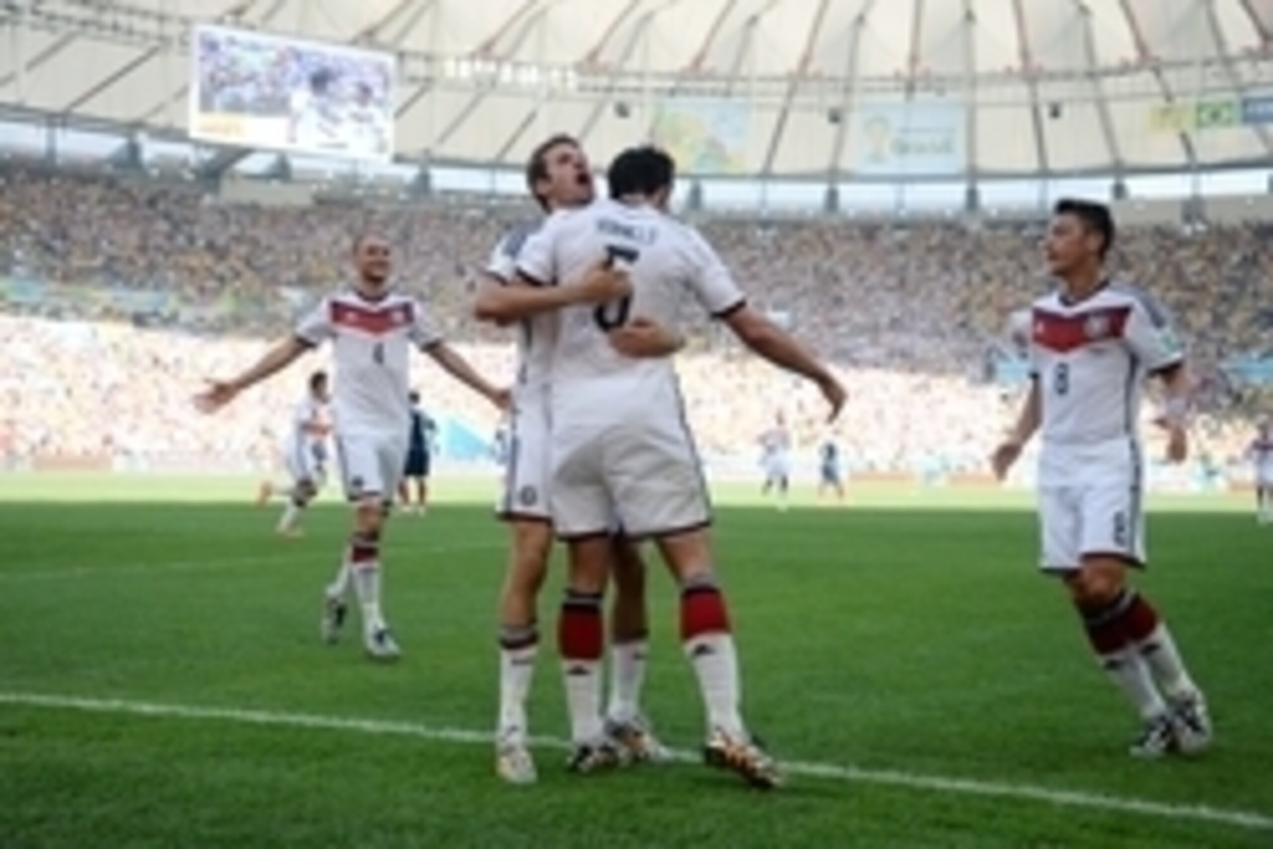 July 4, 2014; Rio De Janeiro, BRAZIL; Germany player Mats Hummels (5) is congratulated by teammates after scoring a goal against France during the quarterfinal match in the 2014 World Cup at Estadio Do Maracana.  Mandatory Credit: Alain Mounic/Presse Spor