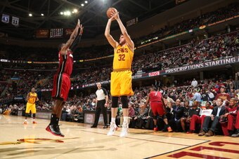 CLEVELAND, OH - MARCH 18: Spencer Hawes #32 of the Cleveland Cavaliers shoots against the Miami Heat at The Quicken Loans Arena on March 18, 2014 in Cleveland, Ohio. NOTE TO USER: User expressly acknowledges and agrees that, by downloading and/or using th