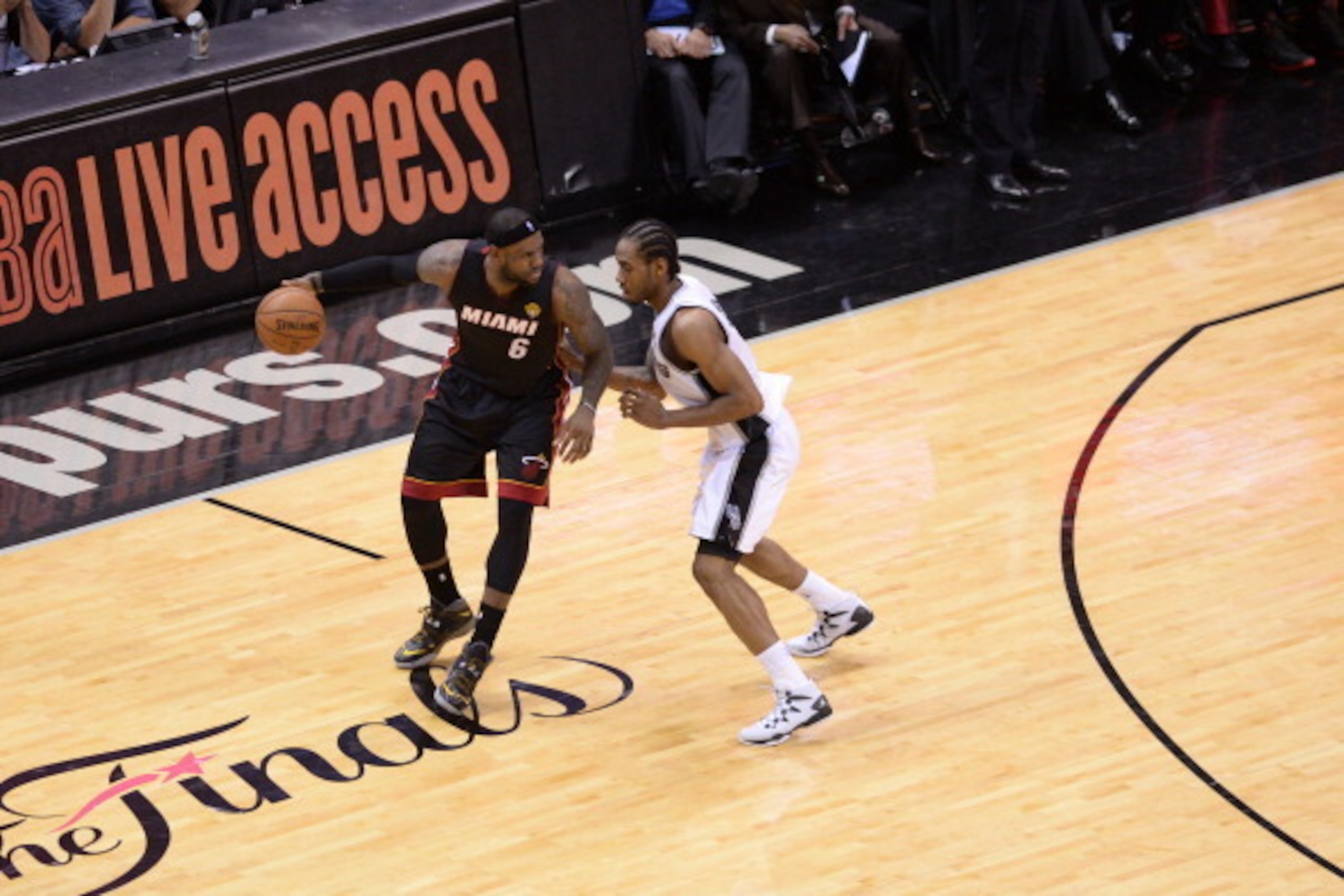 SAN ANTONIO, TX - JUNE 15: LeBron James #6 of the Miami Heat drives to the basket against the San Antonio Spurs during Game Five of the 2014 NBA Finals between the Miami Heat and San Antonio Spurs at AT&T Center on June 15, 2014 in San Antonio, Texas. NOT
