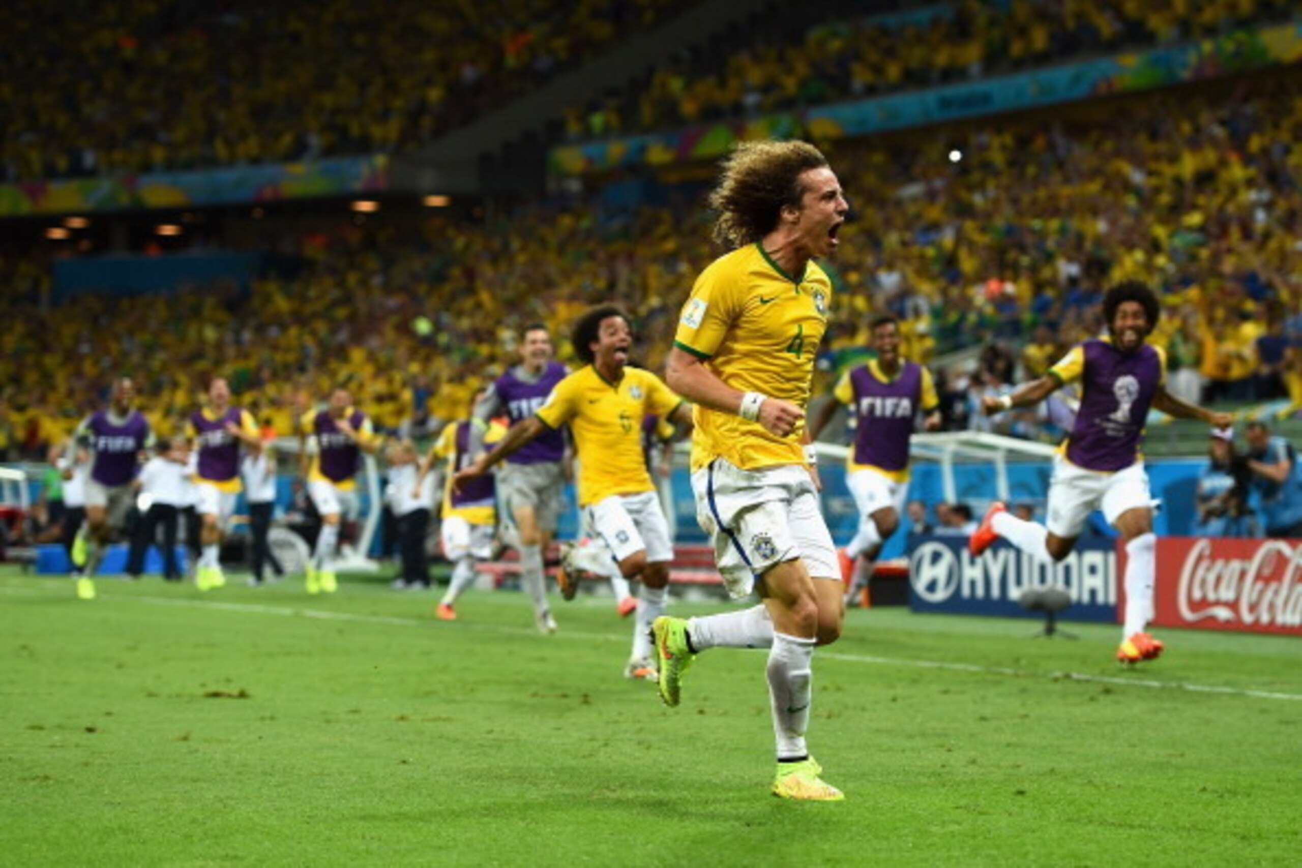 FORTALEZA, BRAZIL - JULY 04: David Luiz of Brazil celebrates scoring his team's second goal during the 2014 FIFA World Cup Brazil Quarter Final match between Brazil and Colombia at Castelao on July 4, 2014 in Fortaleza, Brazil.  (Photo by Laurence Griffit