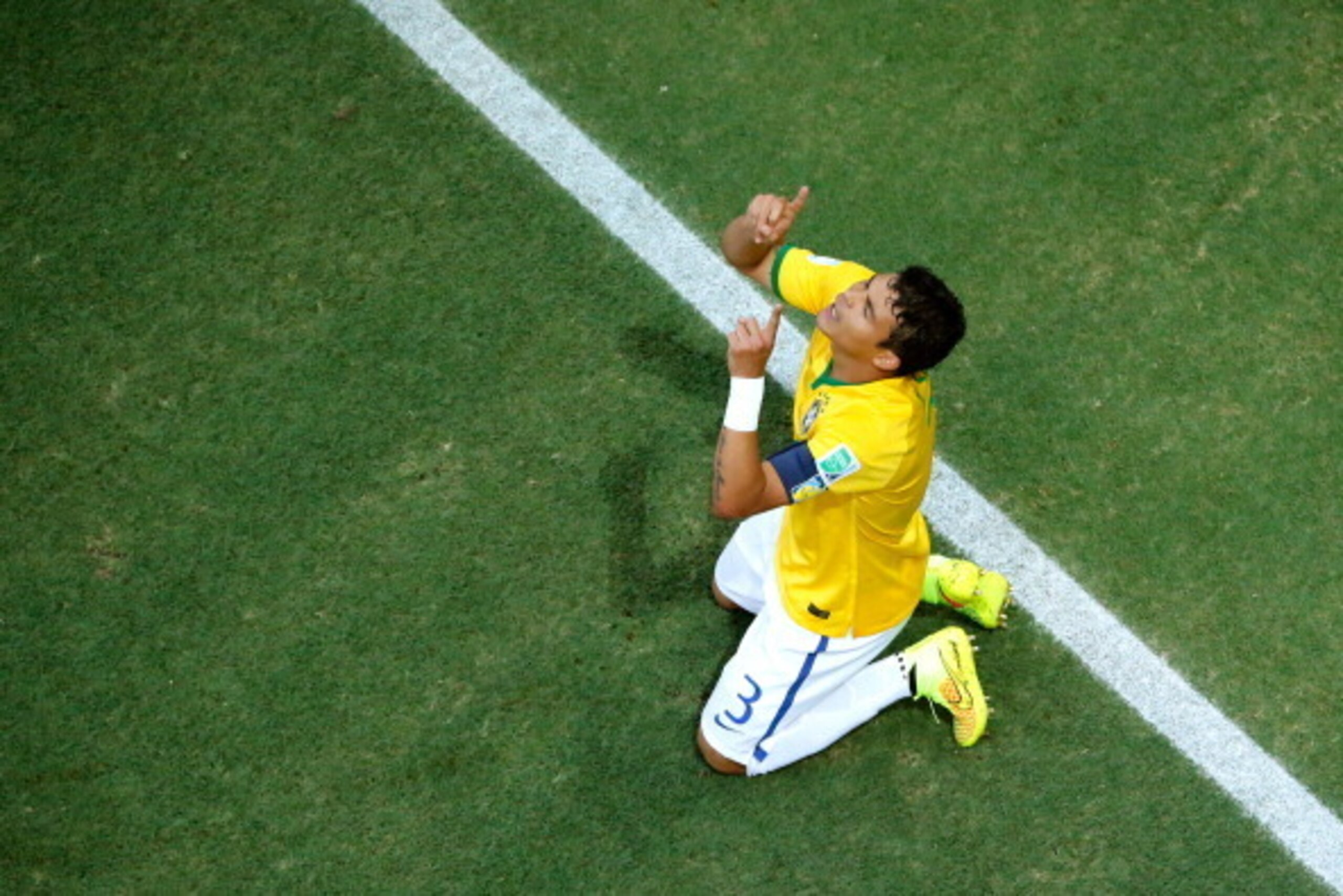 FORTALEZA, BRAZIL - JULY 04: Thiago Silva of Brazil celebrates scoring his team's first goal during the 2014 FIFA World Cup Brazil Quarter Final match between Brazil and Colombia at Castelao on July 4, 2014 in Fortaleza, Brazil. (Photo by Fabrizio Bensch FORTALEZA, BRAZIL - JULY 04: Thiago Silva of Brazil celebrates scoring his team's first goal during the 2014 FIFA World Cup Brazil Quarter Final match between Brazil and Colombia at Castelao on July 4, 2014 in Fortaleza, Brazil. (Photo by Fabrizio Bensch