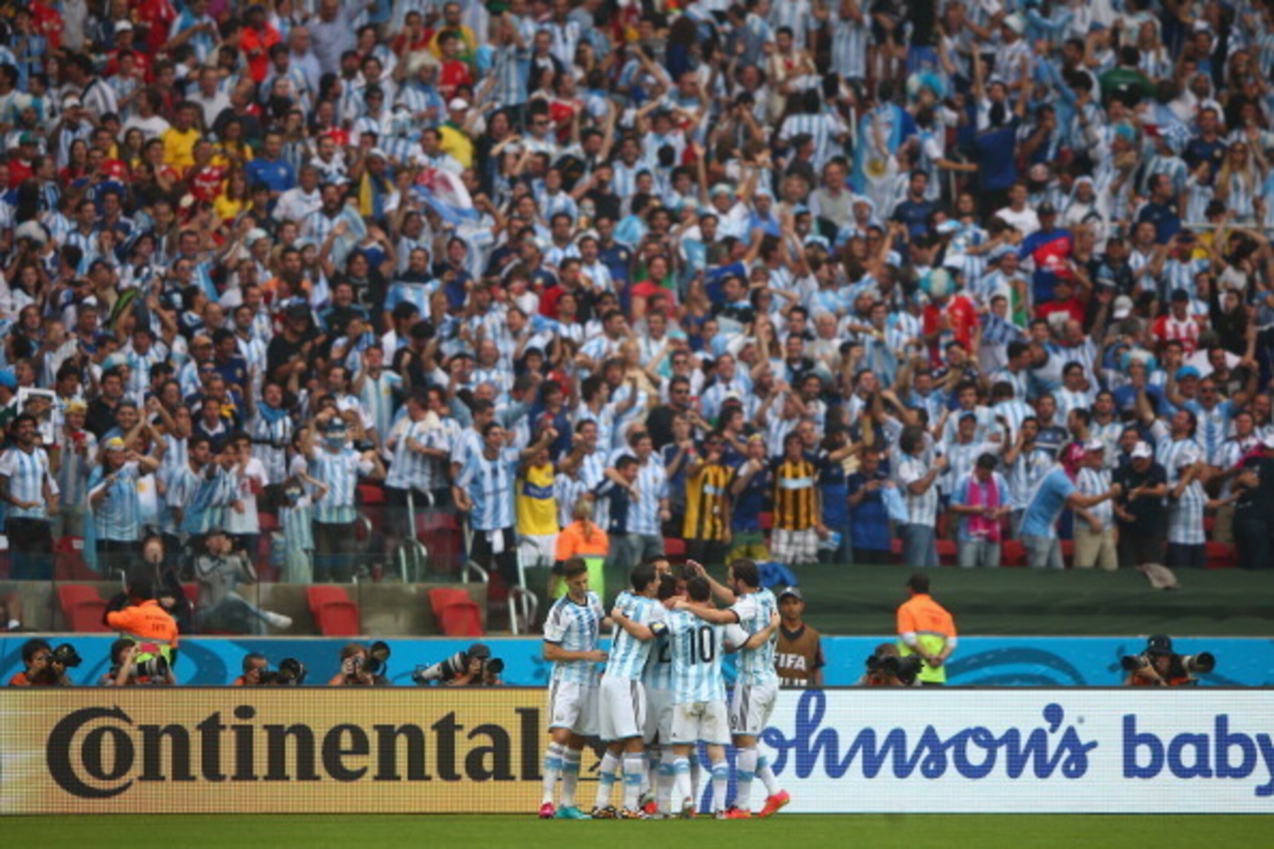 PORTO ALEGRE, BRAZIL - JUNE 25: Marcos Rojo of Argentina celebrates scoring his team's third goal with teammates during the 2014 FIFA World Cup Brazil Group F match between Nigeria and Argentina at Estadio Beira-Rio on June 25, 2014 in Porto Alegre, Brazi