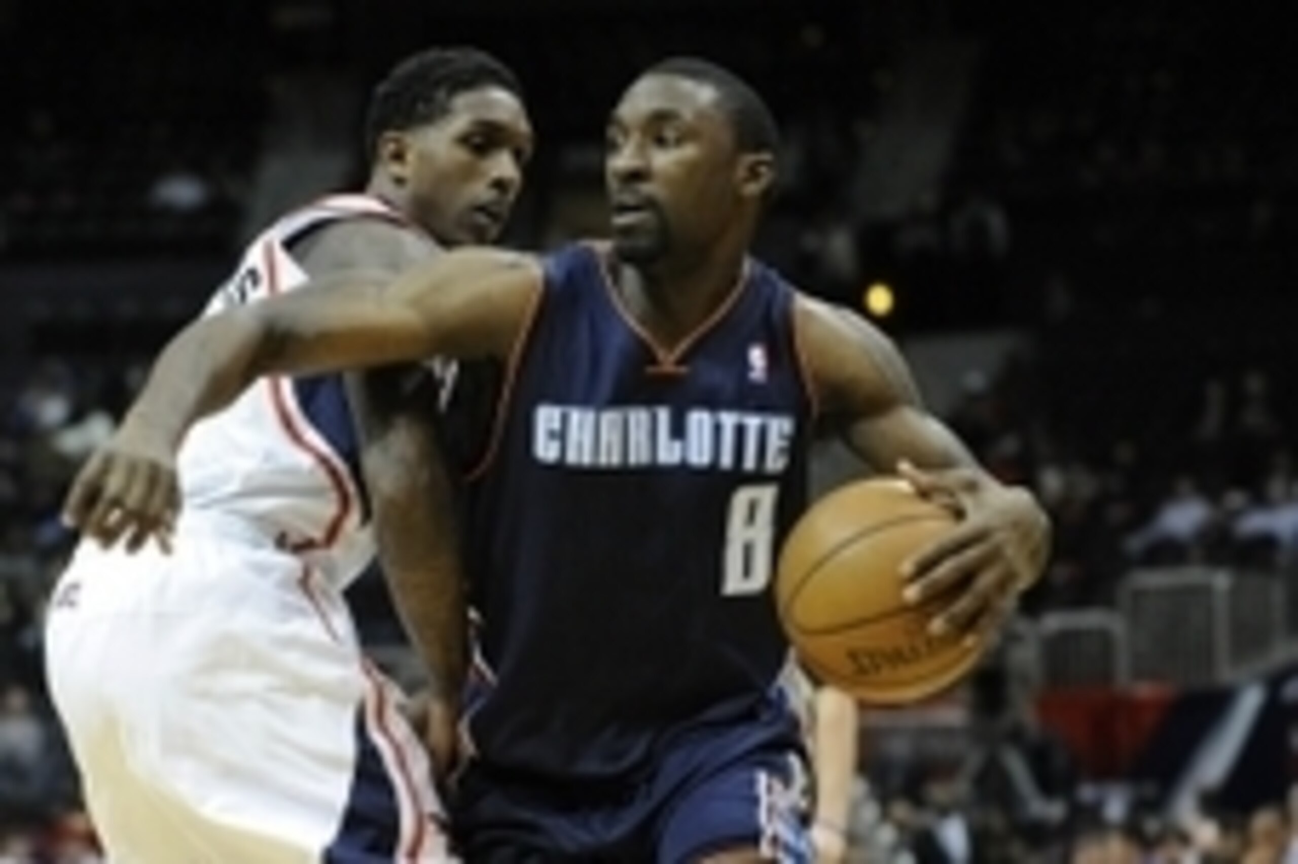 Nov 28, 2012; Atlanta, GA, USA; Charlotte Bobcats shooting guard Ben Gordon (8) is fouled by Atlanta Hawks shooting guard Louis Williams (3) as he drives the ball during the first half at Philips Arena. Mandatory Credit: Paul Abell-USA TODAY Sports