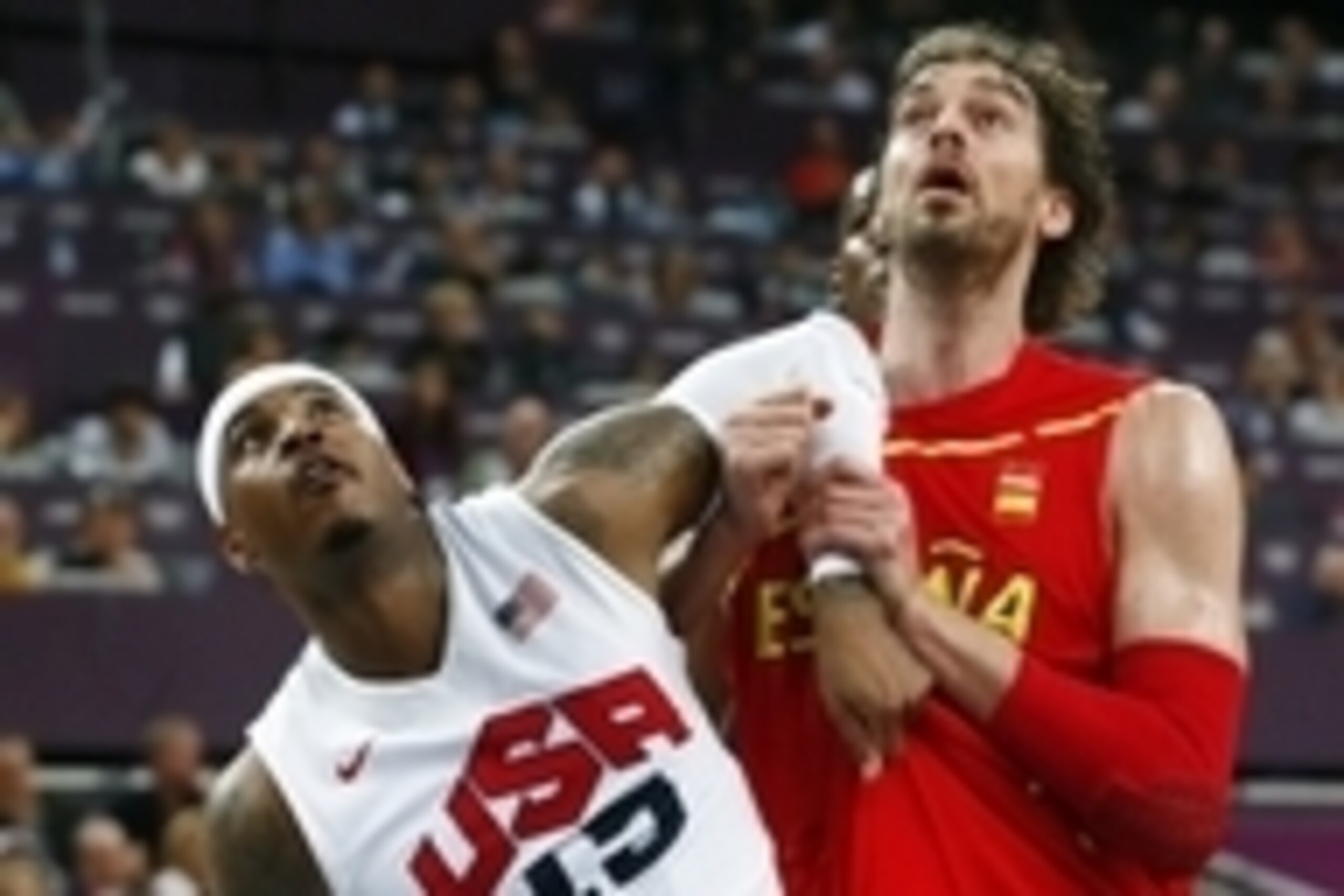 Aug 12, 2012; London, United Kingdom; USA forward Carmelo Anthony (15) battles for position with Spain forward Pau Gasol (4) during the men's basketball gold medal game in the London 2012 Olympic Games at North Greenwich Arena. Mandatory Credit: Rob Schum Aug 12, 2012; London, United Kingdom; USA forward Carmelo Anthony (15) battles for position with Spain forward Pau Gasol (4) during the men's basketball gold medal game in the London 2012 Olympic Games at North Greenwich Arena. Mandatory Credit: Rob Schum