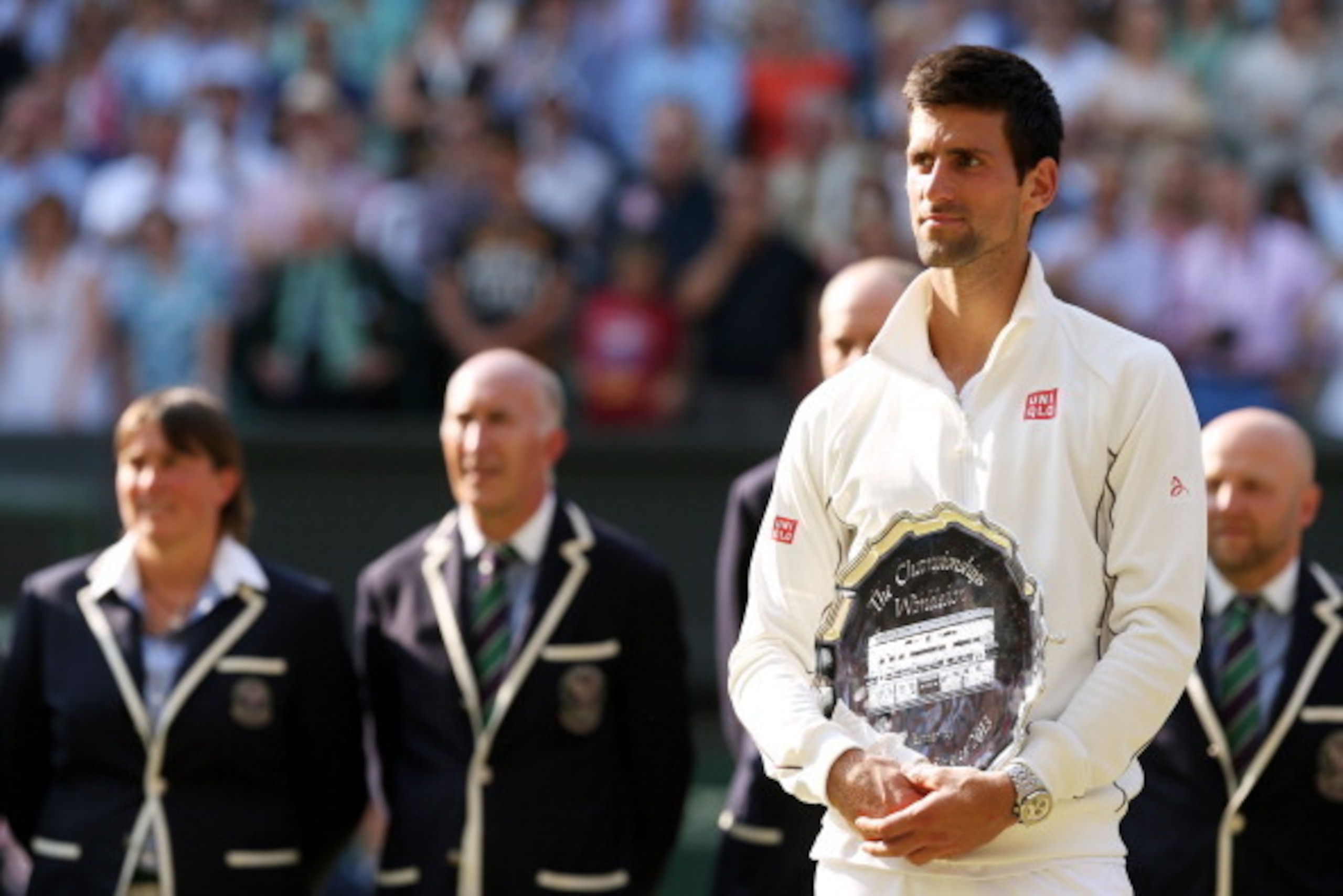 LONDON, ENGLAND - JULY 07:  Andy Murray of Great Britain holds the runner-up trophy following his defeat in the Gentlemen's Singles Final match against Andy Murray of Great Britain on day thirteen of the Wimbledon Lawn Tennis Championships at the All Engl