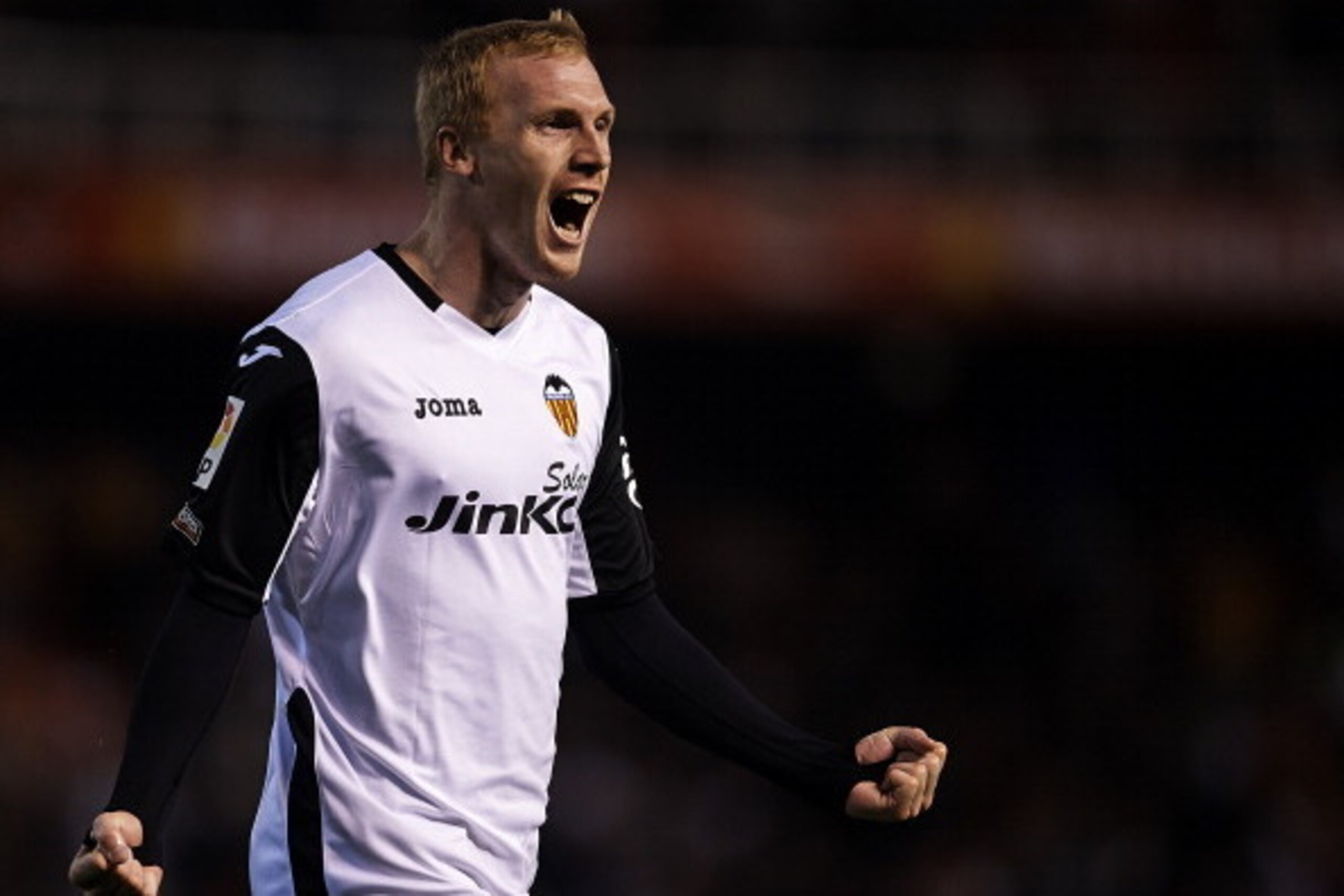 VALENCIA, SPAIN - DECEMBER 22:  Jeremy Mathieu of Valencia celebrates after scoring during the La Liga match between Valencia CF and Real Madrid CF at Estadio Mestalla on December 22, 2013 in Valencia, Spain.  (Photo by Manuel Queimadelos Alonso/Getty Ima