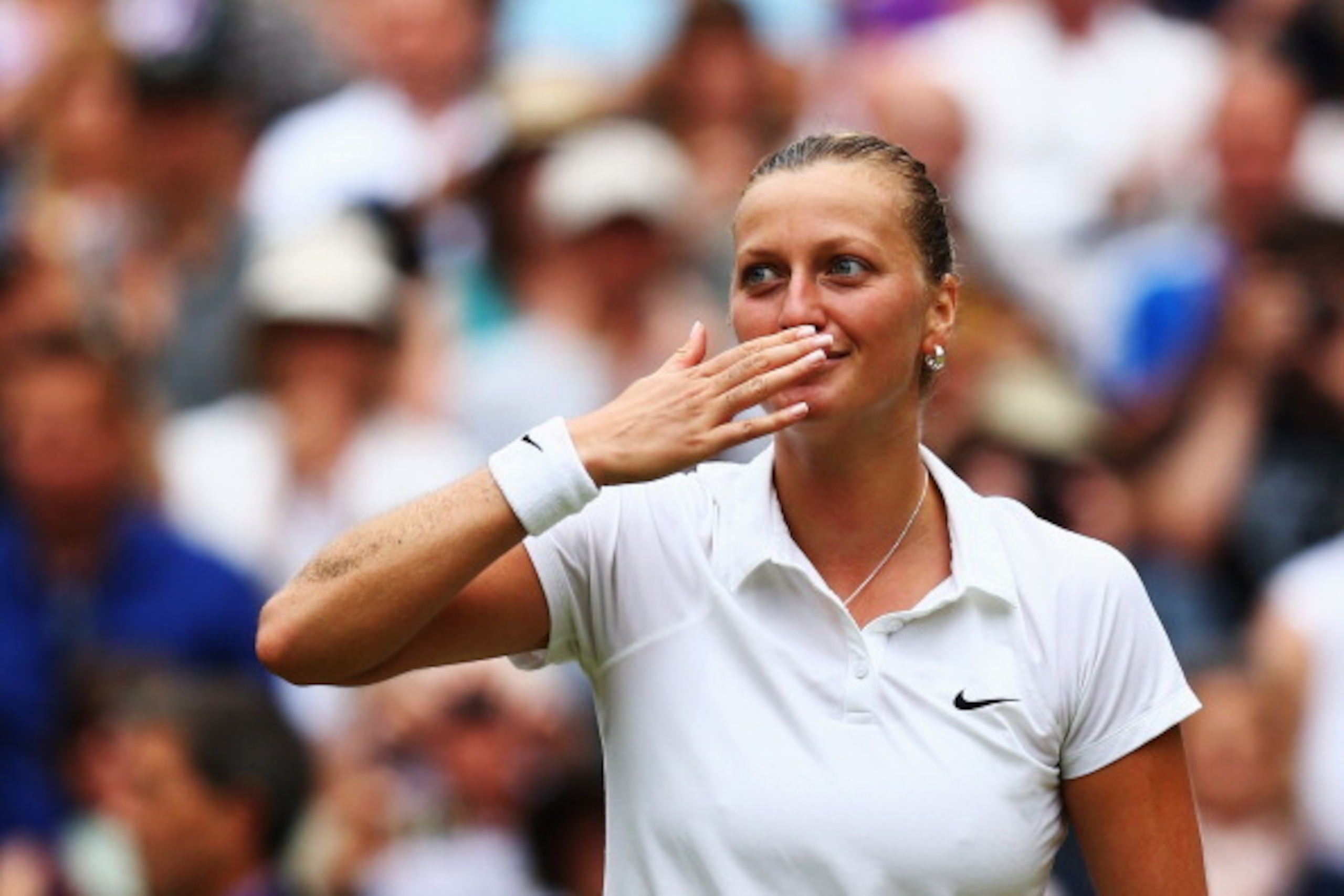 LONDON, ENGLAND - JULY 05:  Petra Kvitova of Czech Republic celebrates winning the Ladies' Singles final match against Eugenie Bouchard of Canada on day twelve of the Wimbledon Lawn Tennis Championships at the All England Lawn Tennis and Croquet Club on J