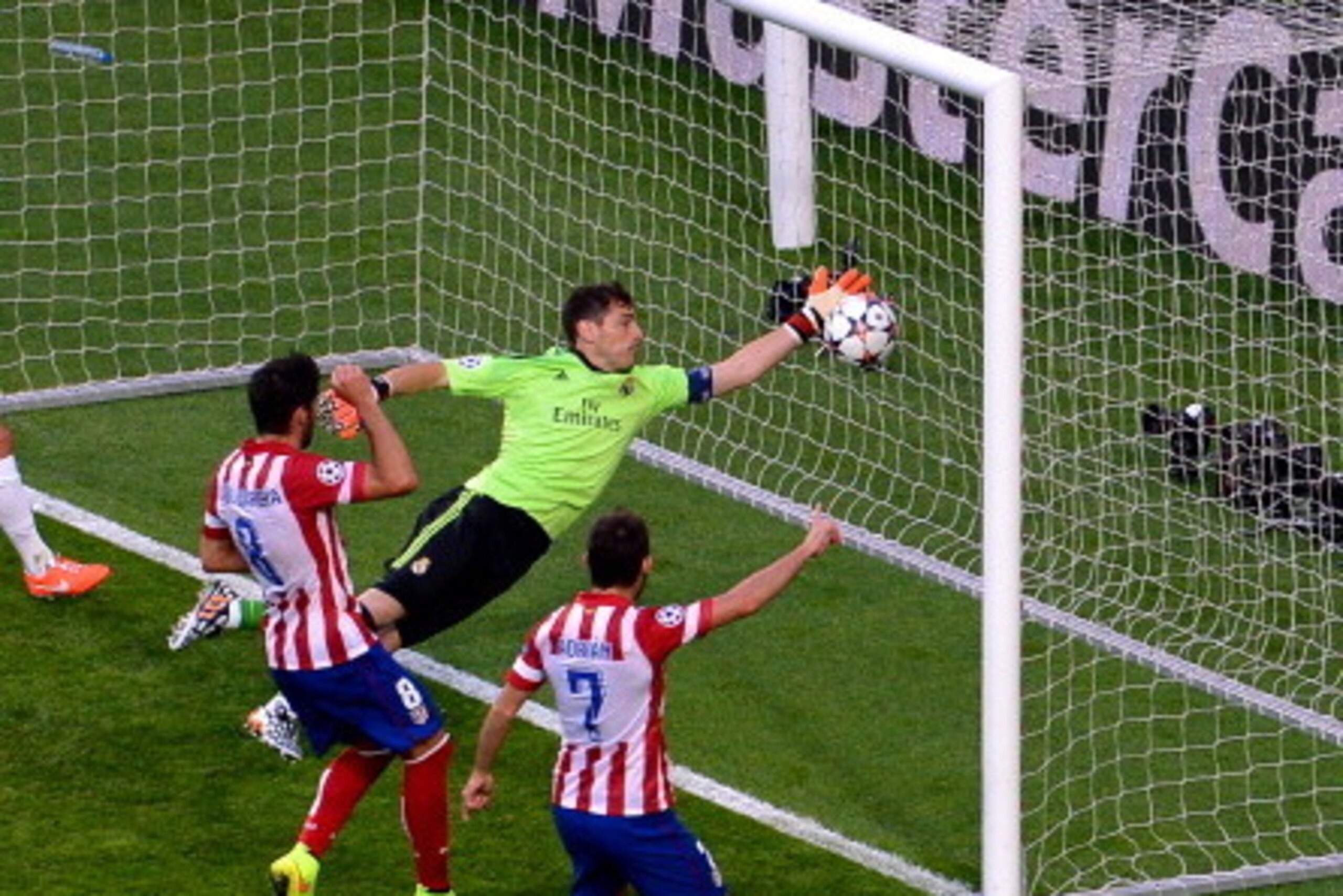 LISBON, PORTUGAL - MAY 24:  Iker Casillas of Real Madrid fails to stop the ball headed in by Diego Godin of Club Atletico de Madrid (not pictured) for the first goal during the UEFA Champions League Final between Real Madrid and Atletico de Madrid at Esta
