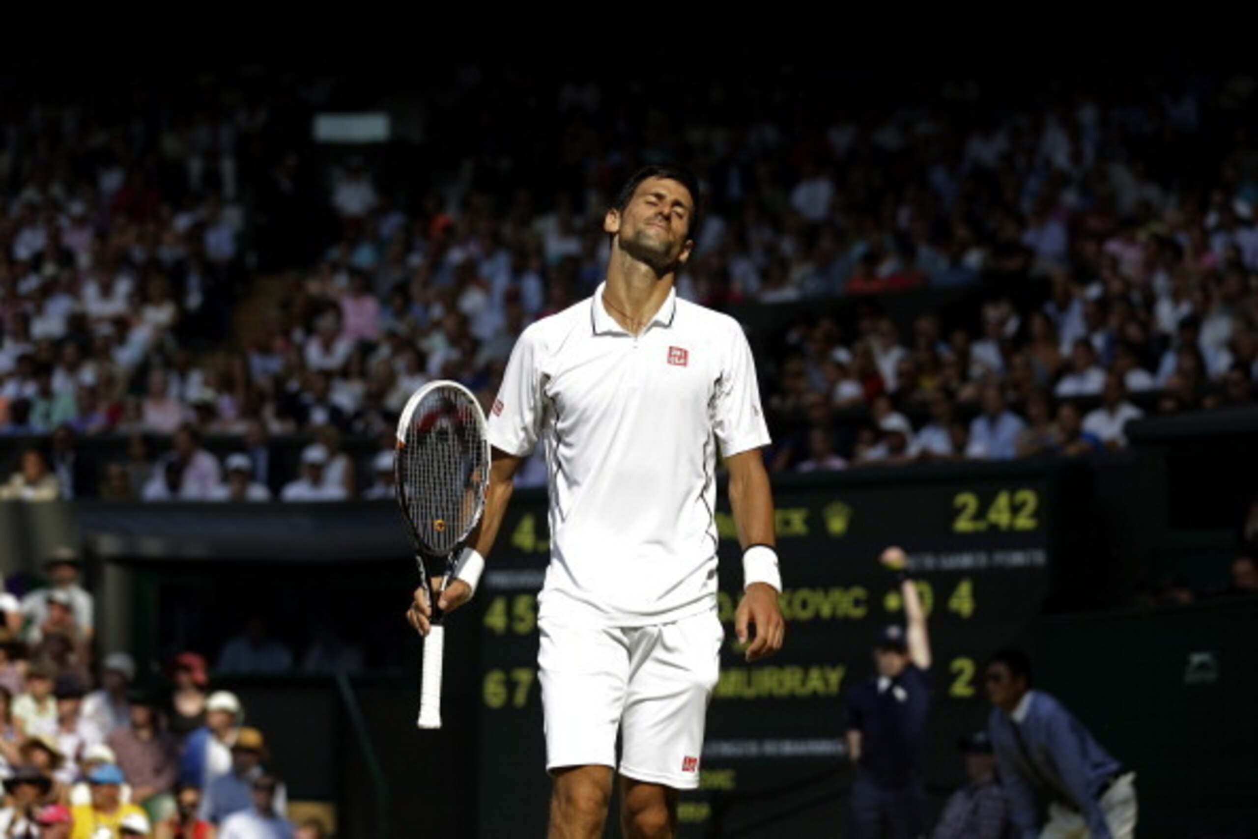LONDON, ENGLAND - JULY 07:  Novak Djokovic of Serbia reacts during the Gentlemen's Singles Final match against Andy Murray of Great Britain on day thirteen of the Wimbledon Lawn Tennis Championships at the All England Lawn Tennis and Croquet Club on July 