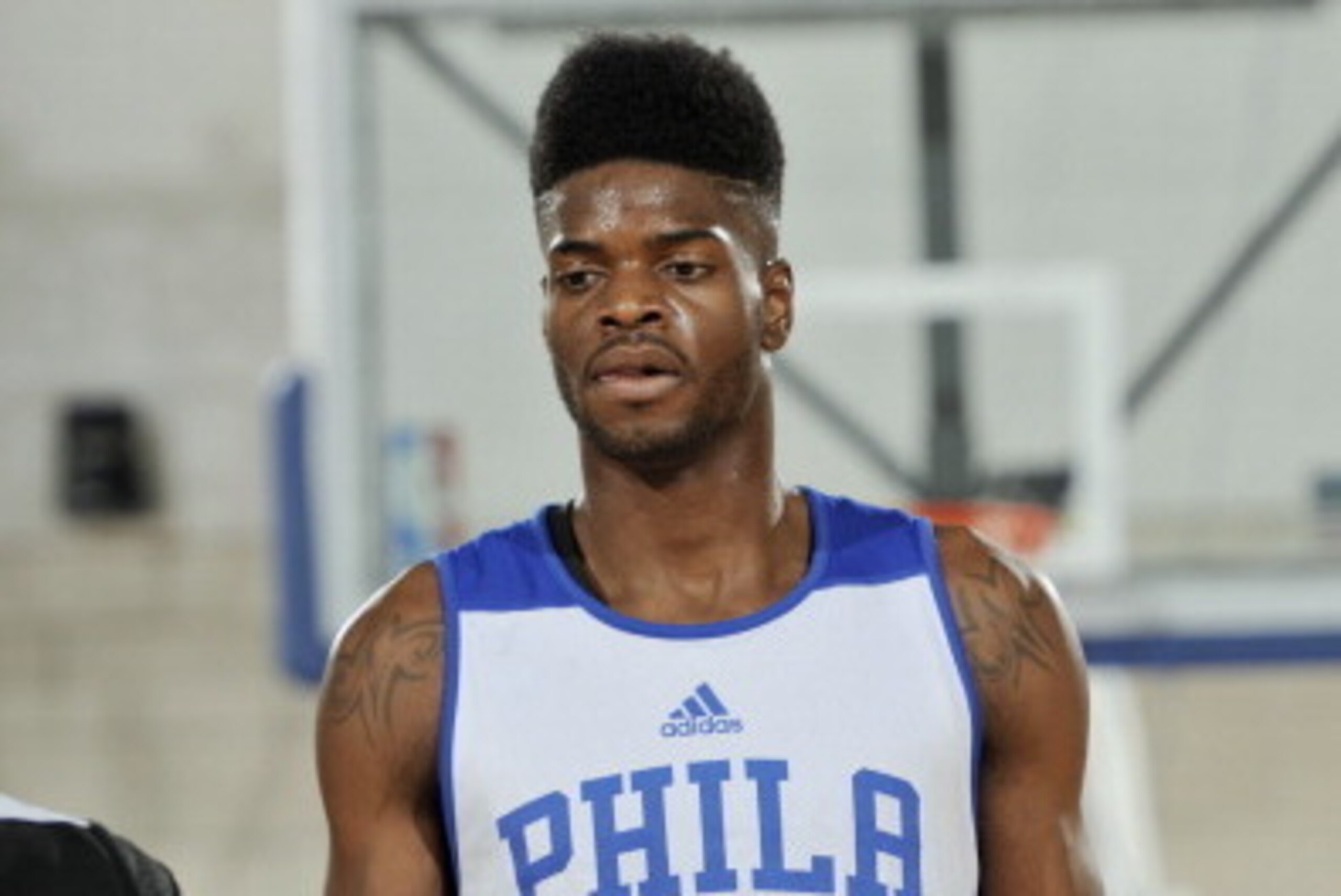 ORLANDO, FL - JULY 5: Nerlens Noel #4 of the Philadelphia 76ers stands on the court during a game against the Orlando Magic on July 5, 2014 at Amway Center in Orlando, Florida. NOTE TO USER: User expressly acknowledges and agrees that, by downloading and 