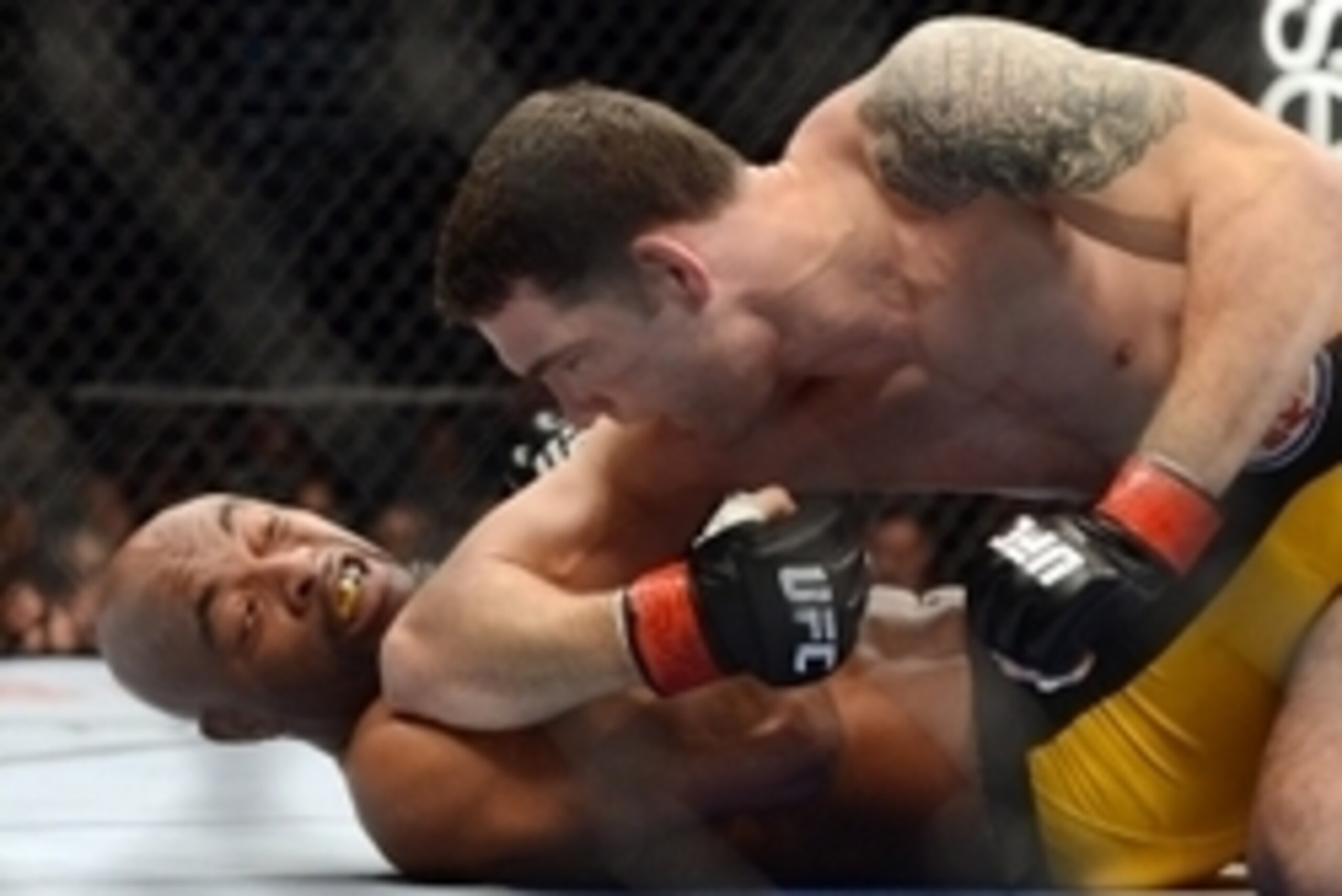Dec 28, 2013; Las Vegas, NV, USA;    Chris Weidman (red gloves) and Anderson Silva (blue gloves) fight during their UFC middleweight championship bout at the MGM Grand Garden Arena. Weidman won. Mandatory Credit: Jayne Kamin-Oncea-USA TODAY Sports
