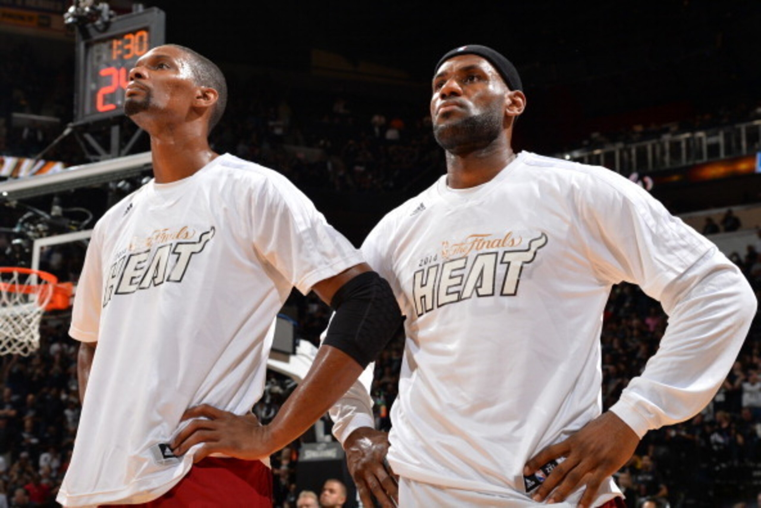 SAN ANTONIO, TX - JUNE 5: LeBron James #6 and Chris Bosh #1 of the Miami Heat looks on against the San Antonio Spurs during Game One of the 2014 NBA Finals on June 5, 2014 at AT&T Center in San Antonio, Texas. NOTE TO USER: User expressly acknowledges and