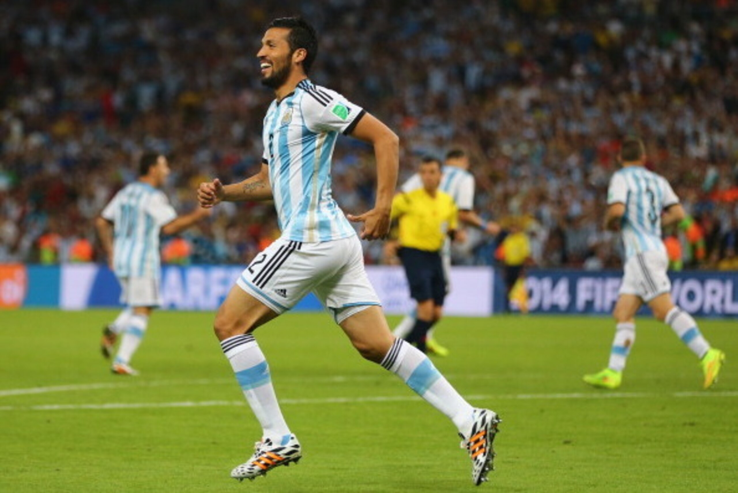 RIO DE JANEIRO, BRAZIL - JUNE 15:  Ezequiel Garay of Argentina celebrates his team's first goal during the 2014 FIFA World Cup Brazil Group F match between Argentina and Bosnia-Herzegovina at Maracana on June 15, 2014 in Rio de Janeiro, Brazil.  (Photo by
