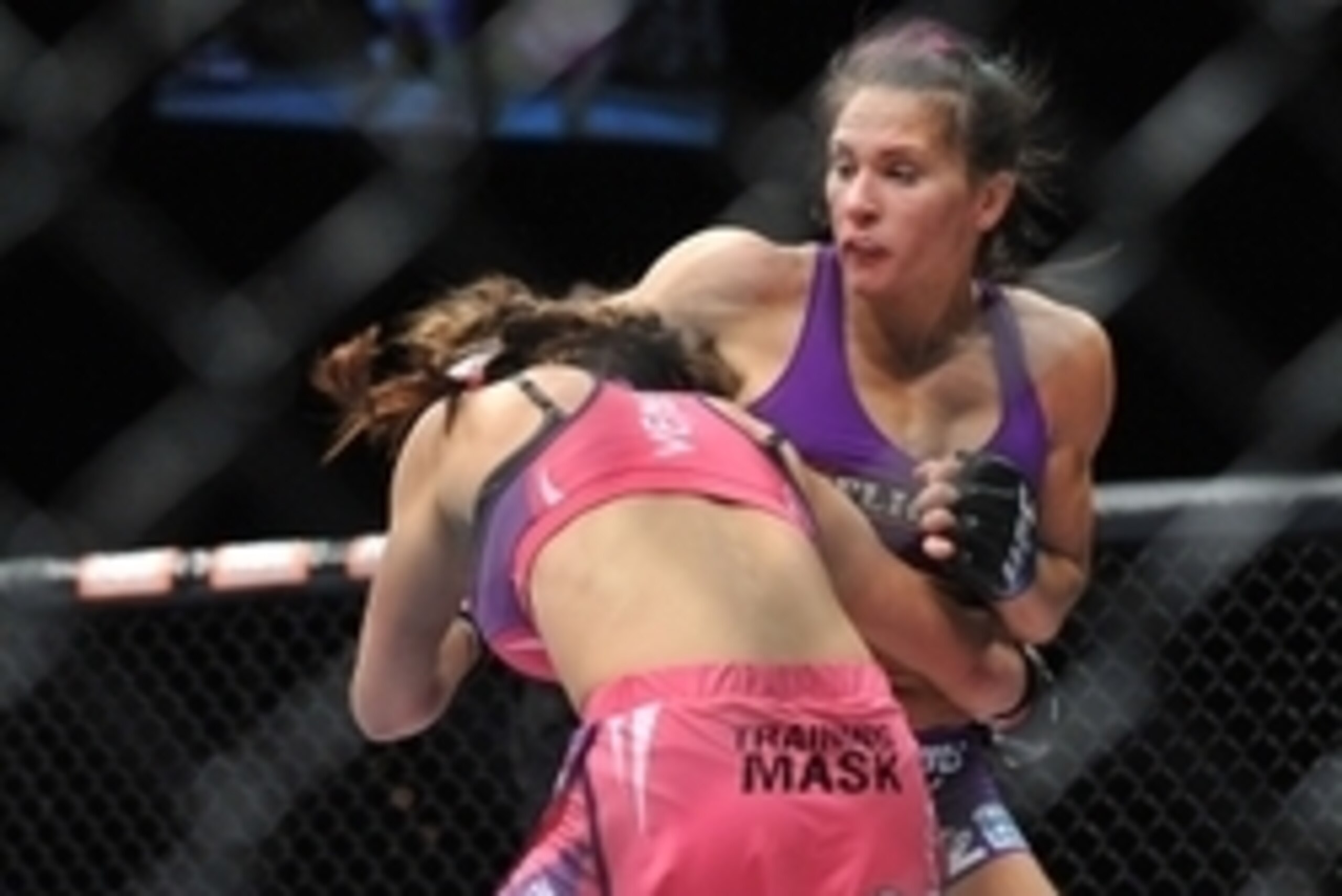 April 13, 2013; Las Vegas, NV, USA; Cat Zingano hits Miesha Tate during the TUF 17 Finale at the Mandalay Bay Events Center. Mandatory Credit: Gary A. Vasquez-USA TODAY Sports April 13, 2013; Las Vegas, NV, USA; Cat Zingano hits Miesha Tate during the TUF 17 Finale at the Mandalay Bay Events Center. Mandatory Credit: Gary A. Vasquez-USA TODAY Sports
