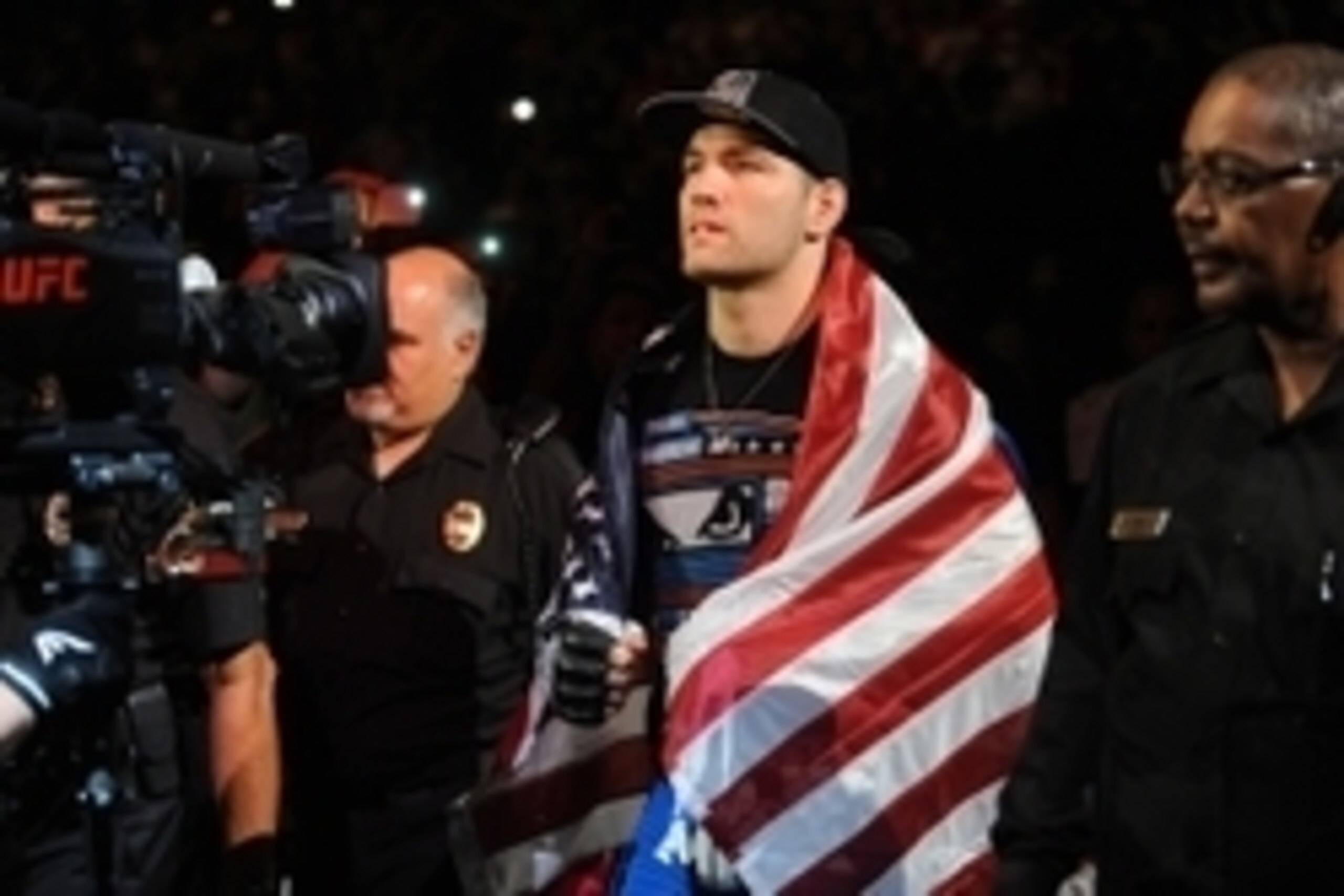 Jul 5, 2014; Las Vegas, NV, USA; Chris Weidman gets ready to enter the octagon for a middleweight title fight against Lyoto Machida at Mandalay Bay Events Center. Mandatory Credit: Stephen R. Sylvanie-USA TODAY Sports Jul 5, 2014; Las Vegas, NV, USA; Chris Weidman gets ready to enter the octagon for a middleweight title fight against Lyoto Machida at Mandalay Bay Events Center. Mandatory Credit: Stephen R. Sylvanie-USA TODAY Sports