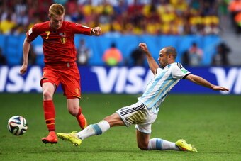 BRASILIA, DF - JULY 05:  Javier Mascherano of Argentina tackles Kevin De Bruyne of Belgium during the 2014 FIFA World Cup Brazil Quarter Final match between Argentina and Belgium at Estadio Nacional on July 5, 2014 in Brasilia, Brazil.  (Photo by Matthias