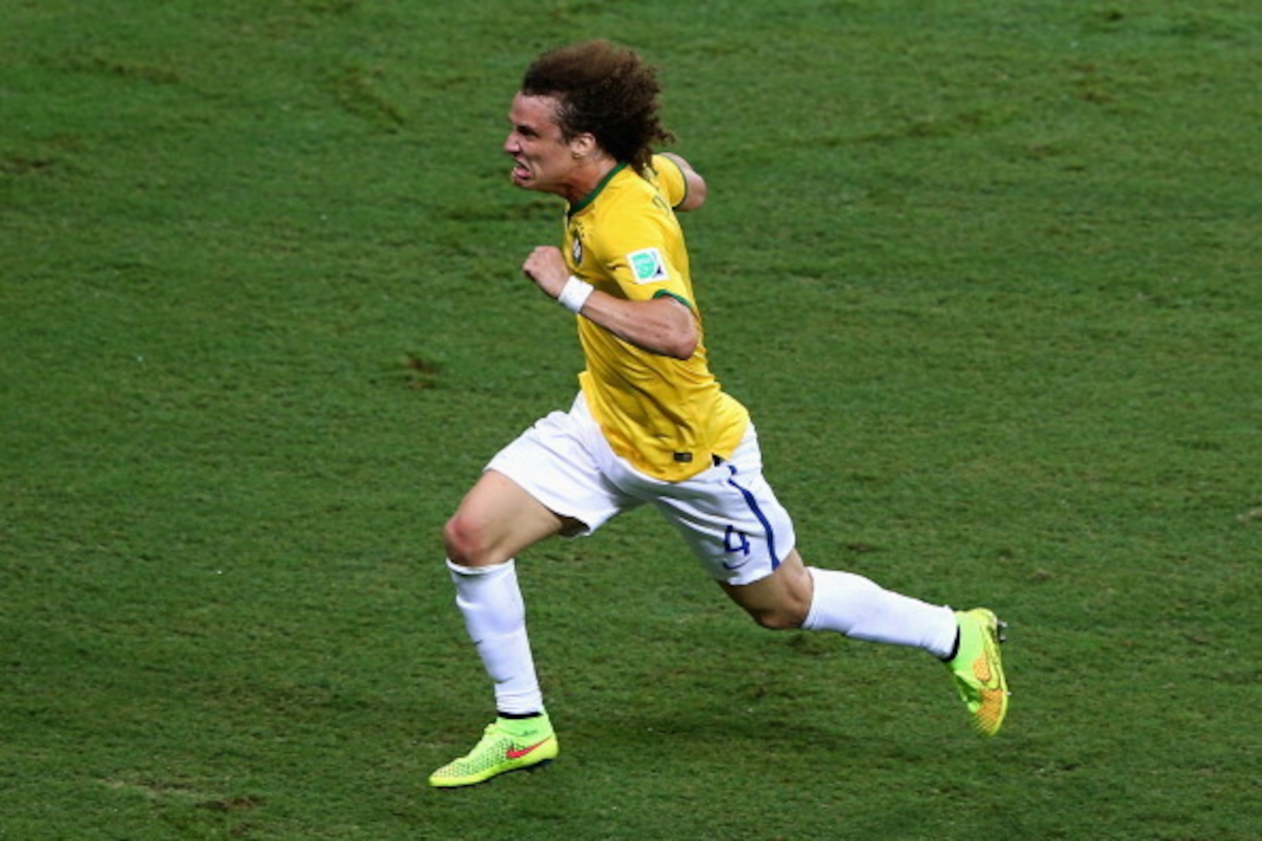 FORTALEZA, BRAZIL - JULY 04:  David Luiz of Brazil celebrates scoring his team's second goal during the 2014 FIFA World Cup Brazil Quarter Final match between Brazil and Colombia at Castelao on July 4, 2014 in Fortaleza, Brazil.  (Photo by Michael Steele/