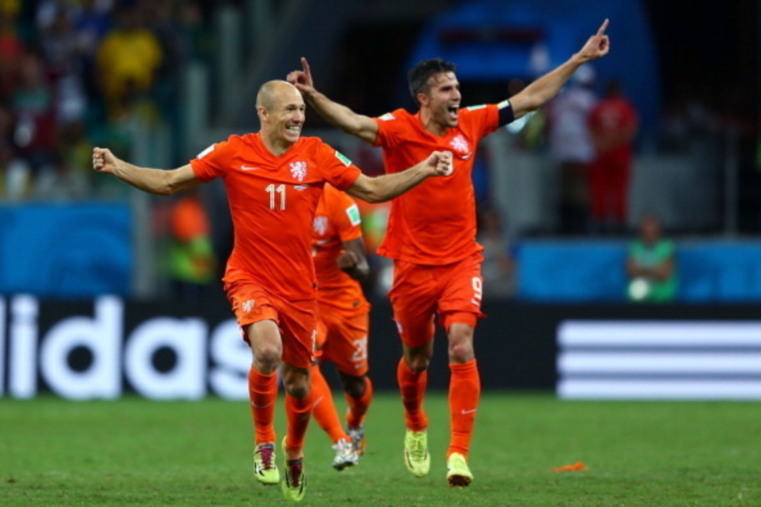 SALVADOR, BRAZIL - JULY 05:  Arjen Robben and Robin van Persie of the Netherlands celebrate after defeating Costa Rica in a penalty shootout during the 2014 FIFA World Cup Brazil Quarter Final match between the Netherlands and Costa Rica at Arena Fonte No