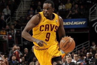 CLEVELAND, OH - MARCH 30:  Luol Deng #9 of the Cleveland Cavaliers handles the ball against the Indiana Pacers at The Quicken Loans Arena on March 30, 2014 in Cleveland, Ohio. NOTE TO USER: User expressly acknowledges and agrees that, by downloading and/o