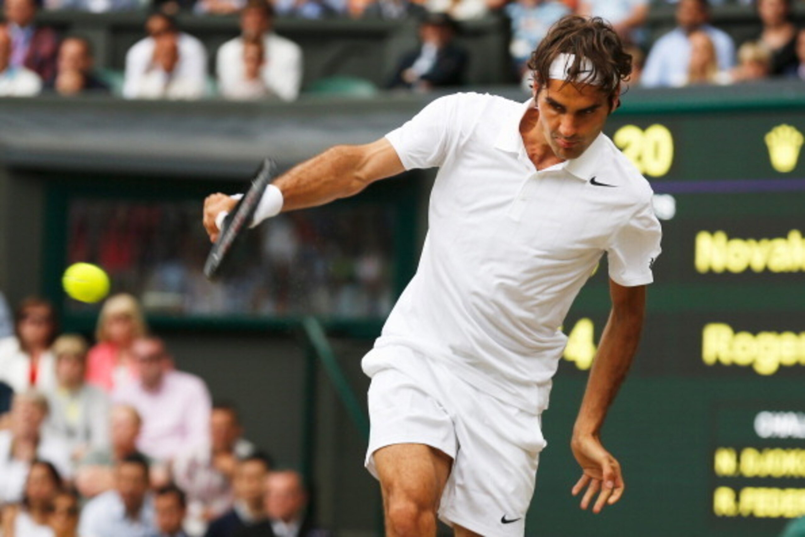 LONDON, ENGLAND - JULY 06:  Roger Federer of Switzerland during the Gentlemen's Singles Final match against Novak Djokovic of Serbia on day thirteen of the Wimbledon Lawn Tennis Championships at the All England Lawn Tennis and Croquet Club on July 6, 2014