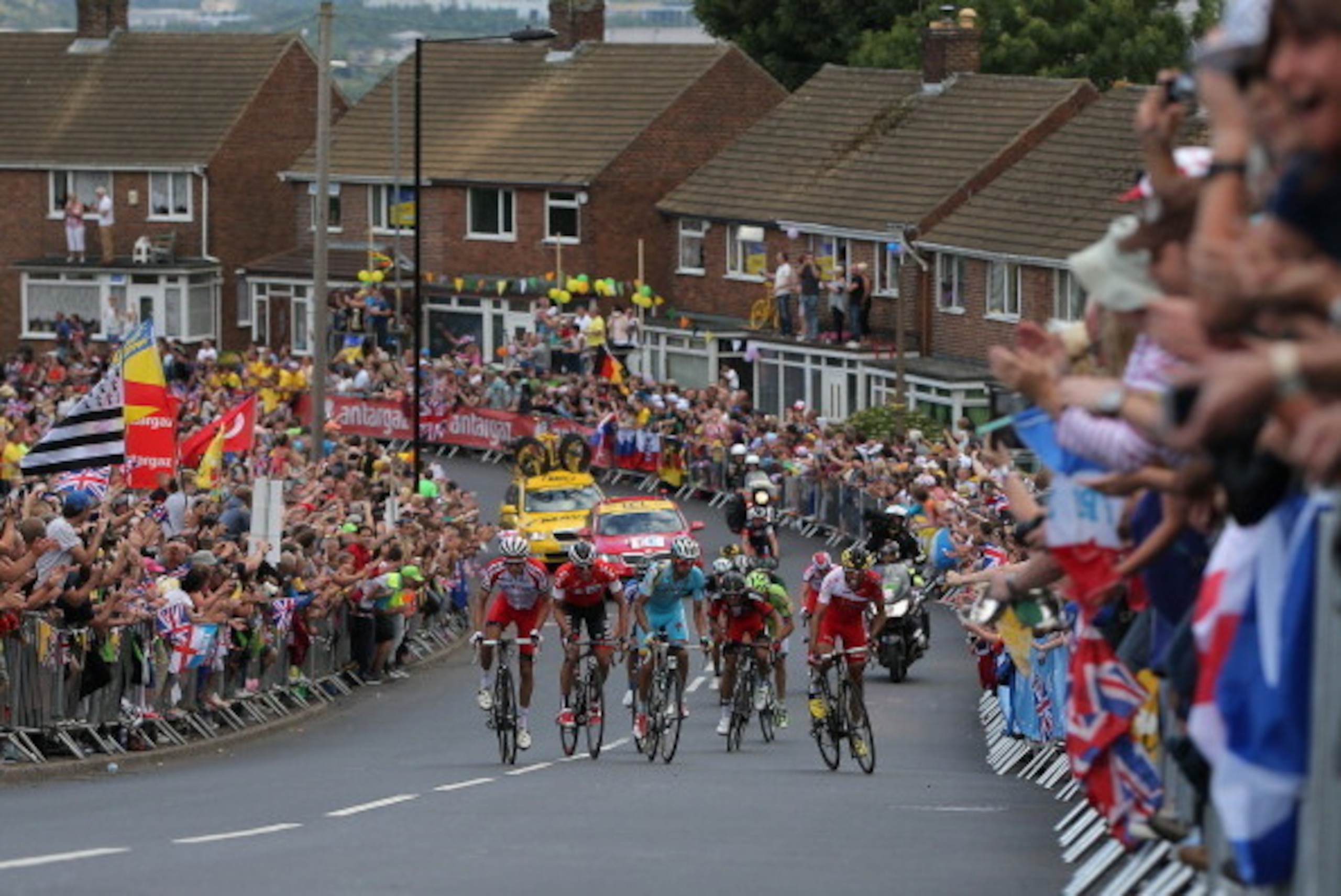 SHEFFIELD, ENGLAND - JULY 06: Riders make the climb of the Cote de Kenkins Road to the excitement of the fans during stage two of the 2014 Le Tour de France from York to Sheffield on July 6, 2014 in Sheffield, United Kingdom. (Photo by Doug Pensinger/Ge SHEFFIELD, ENGLAND - JULY 06: Riders make the climb of the Cote de Kenkins Road to the excitement of the fans during stage two of the 2014 Le Tour de France from York to Sheffield on July 6, 2014 in Sheffield, United Kingdom. (Photo by Doug Pensinger/Ge