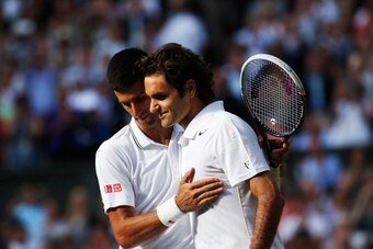 LONDON, ENGLAND - JULY 06:  Novak Djokovic of Serbia shakes hands with Roger Federer of Switzerland after their Gentlemen's Singles Final match on day thirteen of the Wimbledon Lawn Tennis Championships at the All England Lawn Tennis and Croquet Club on J